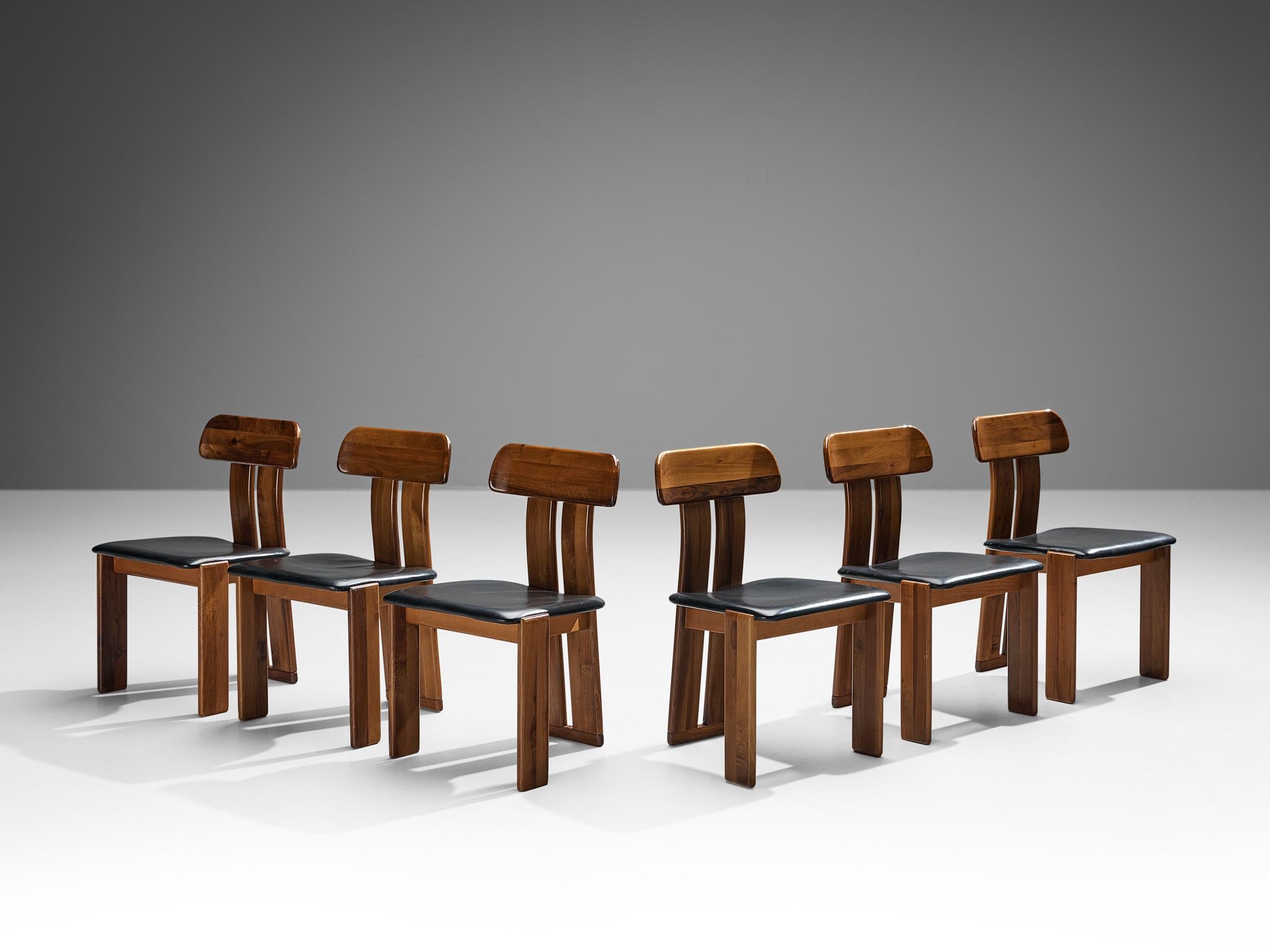 Mario Marenco for Mobil Girgi, set of six dining chairs model ‘Sapporo’, walnut, black leather, Italy, 1970s

Beautiful set of six dining chairs in walnut and black leather designed by Mario Marenco in the 1970s. These chairs feature wonderful