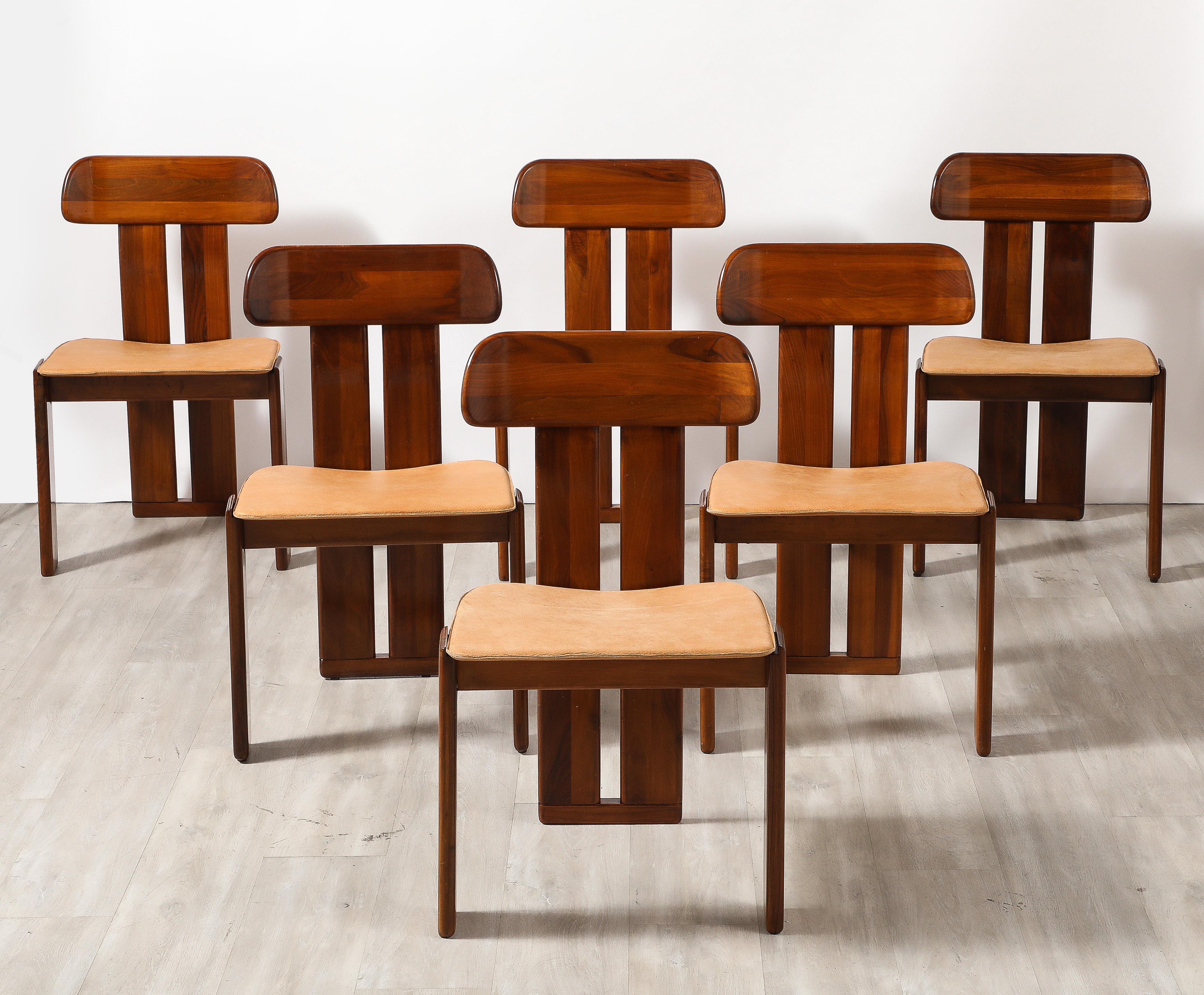 The highly acclaimed and superbly crafted 'Sapporo' dining chairs, designed by Mario Marenco for Mobil Girgi, Italy, circa 1970. These chairs are made from Italian walnut with a stunning grain pattern. The chairs are a timeless classic, crafted with