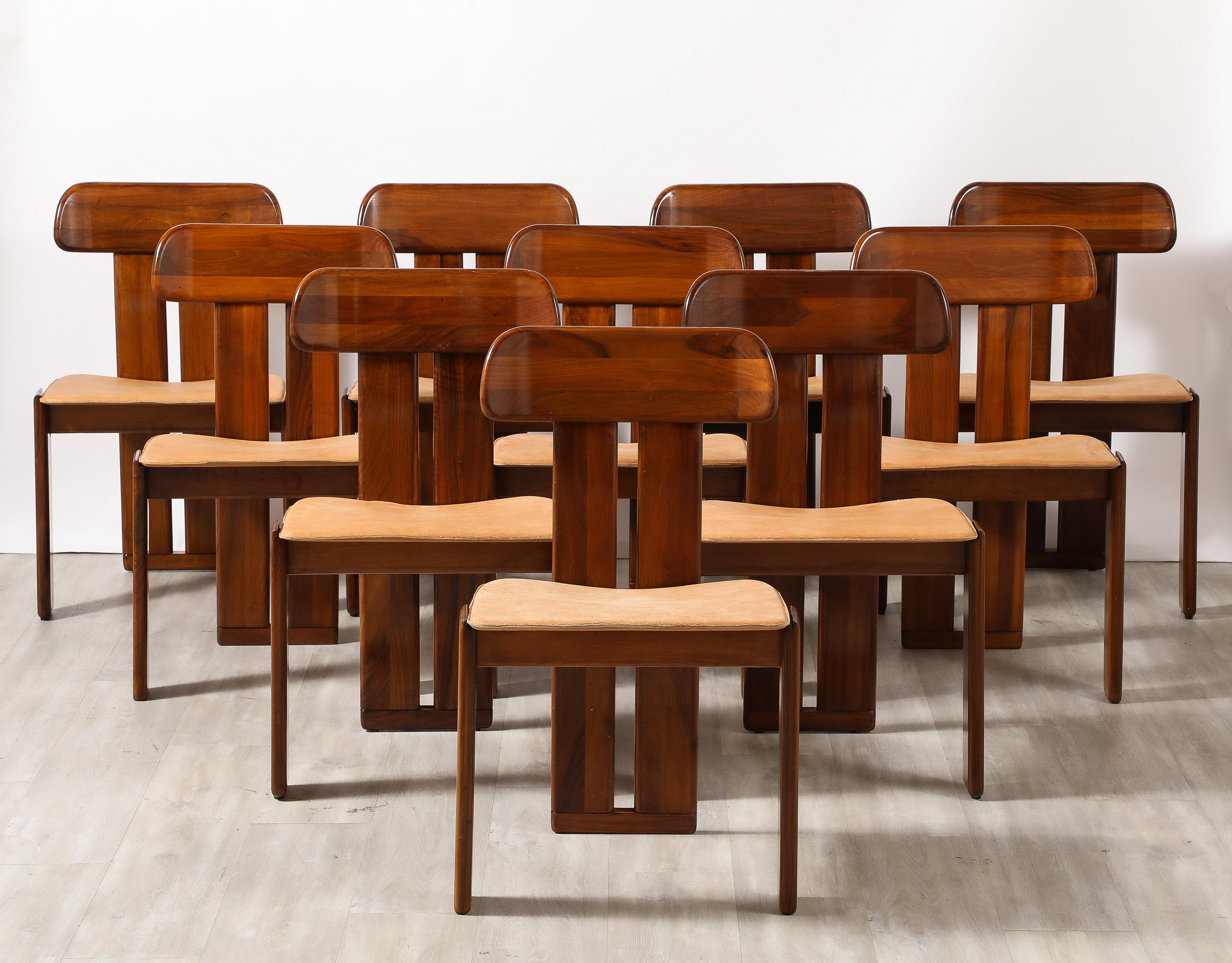 The highly acclaimed and superbly crafted 'Sapporo' dining chairs, designed by Mario Marenco for Mobil Girgi, Italy, circa 1970. These chairs are made from Italian walnut with a stunning grain pattern. The chairs are a timeless classic, crafted with