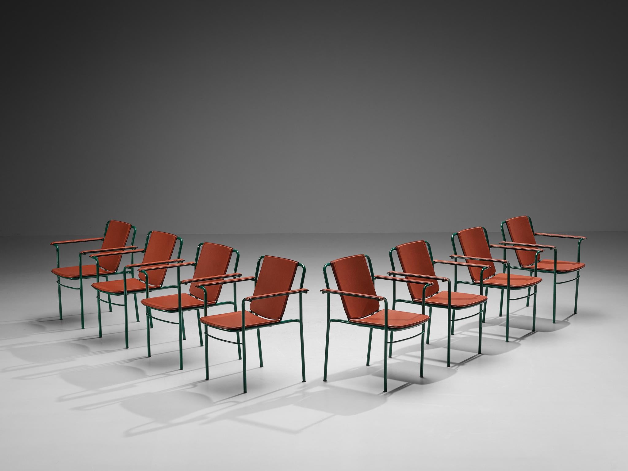 Mario Marenco for Poltrona Frau, set of eight 'Movie' armchairs, lacquered steel and leather, Italy, 1984.

Set of Italian armchairs in a bright color combination. The seat are padded and upholstered in coral red leather. The edges have a black