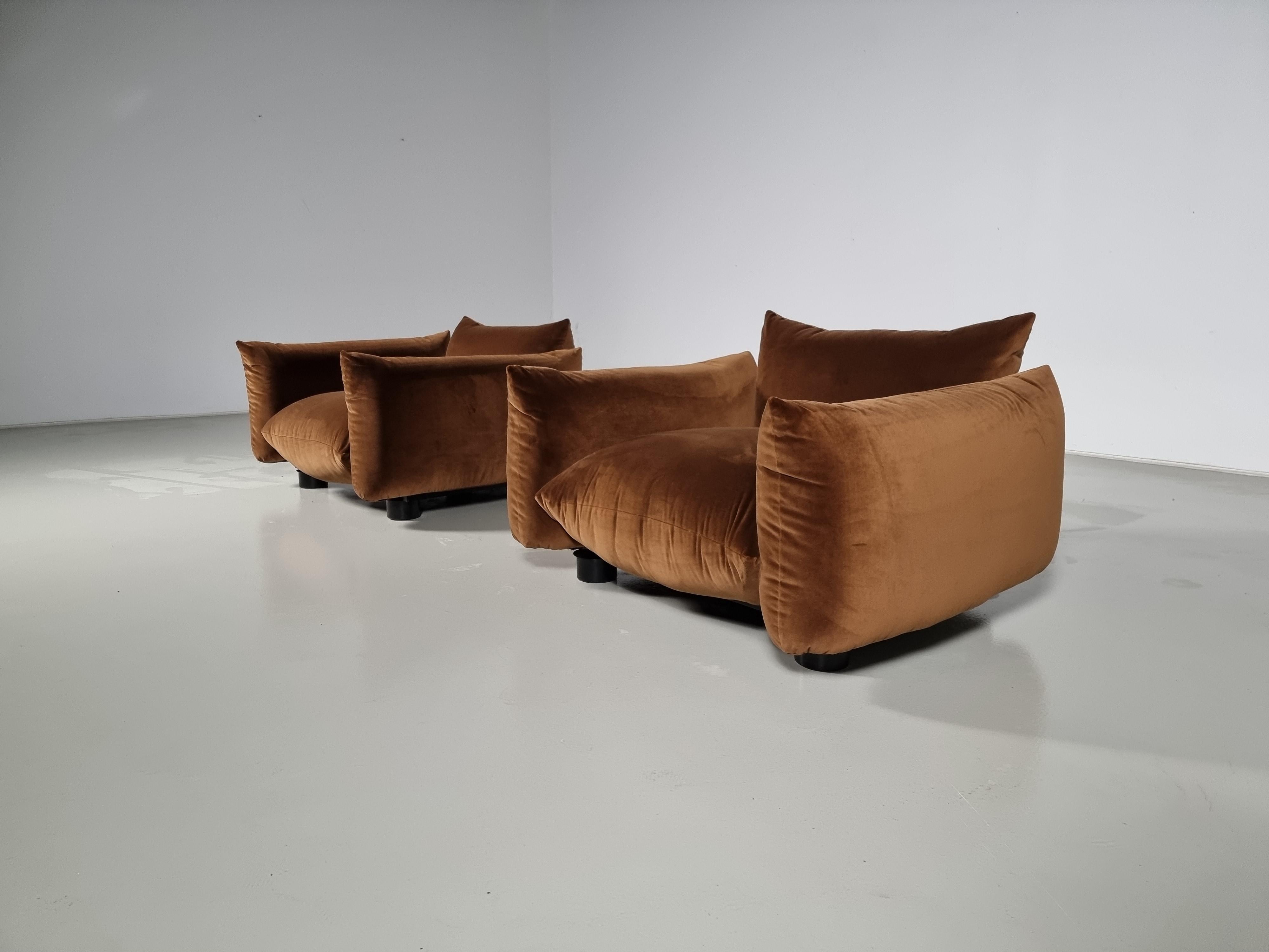 Mario Marenco for Arflex, 'Marenco' lounge chairs, velvet, Italy, 1970

These Marenco chairs were designed by Mario Marenco for Arflex. This sofa features a system with making the armrest and seats the base portion. There is a metal tubular frame