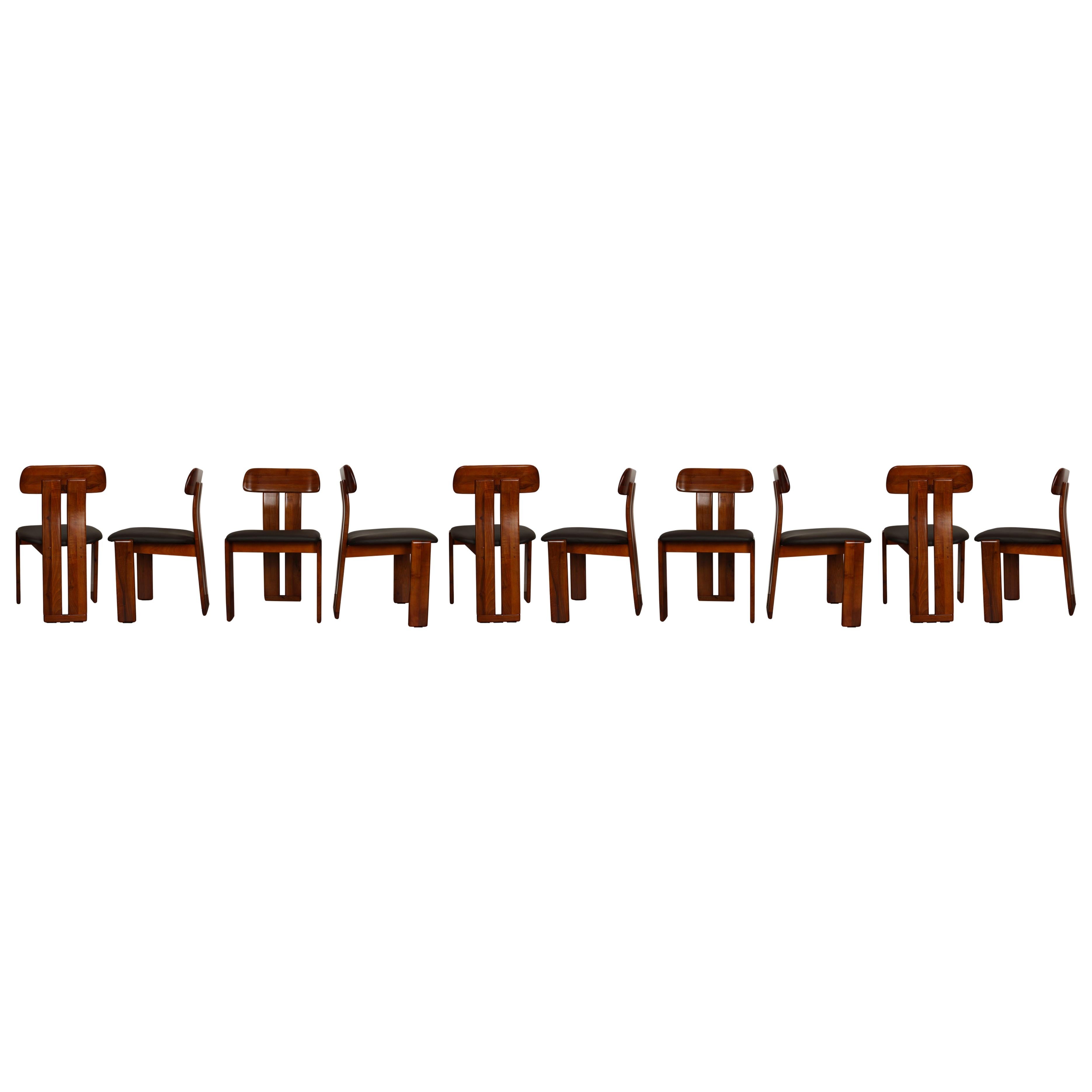 Set of ten “Sapporo” dining chairs, designed by Mario Marenco and produced by the Italian manufacturer Mobilgirgi in the 1970s.
They feature a walnut briar structure and a brown leather seater.

Fully restored in Italy..

The highly acclaimed
