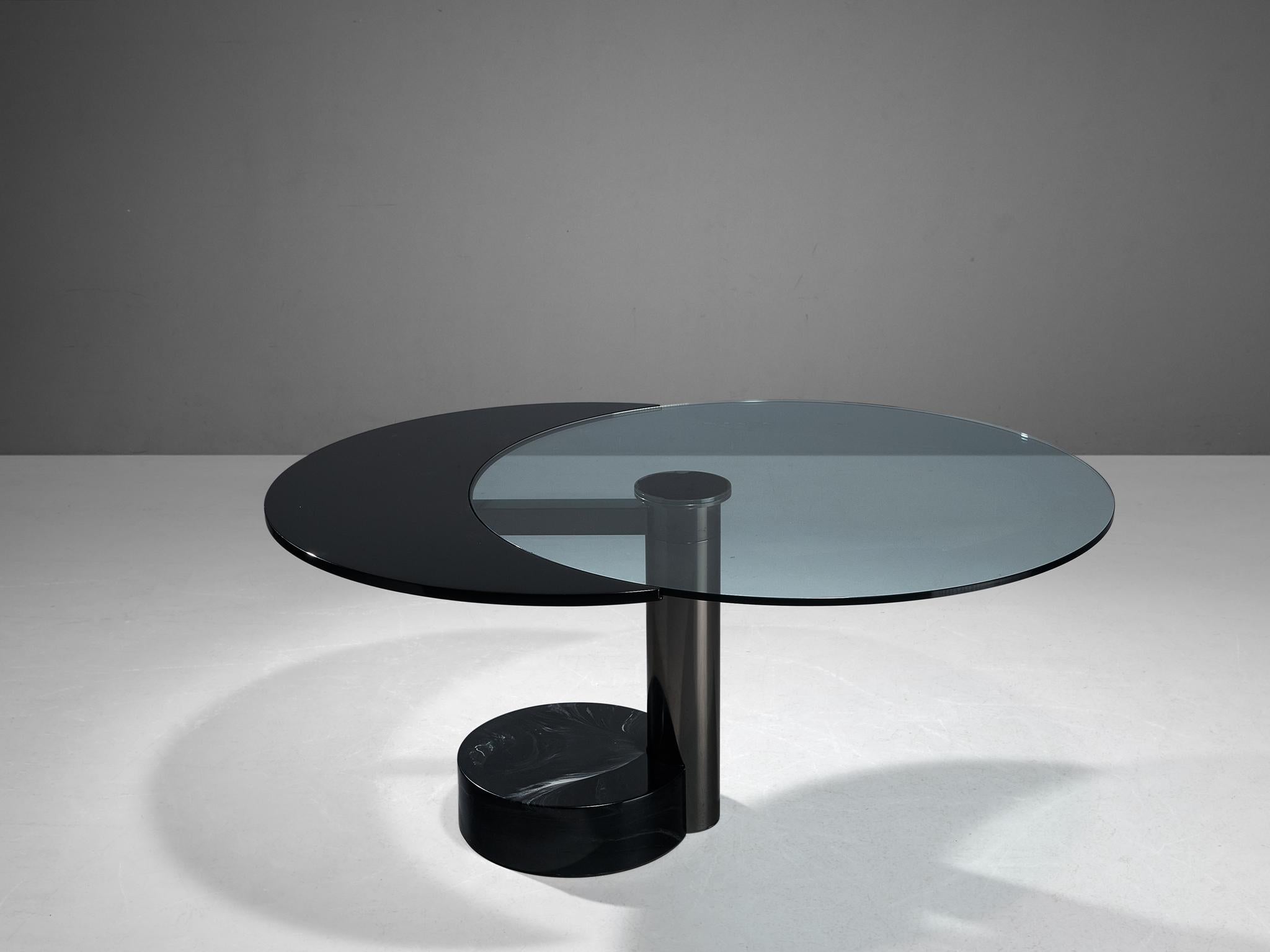 Mario Mazzer for Zanette, dining table, marble glass, chrome-plated metal, lacquered wood, Italy, 1980s 

This dining table carries a metamorphic soul that embraces both functionality and poetical compositions. The construction of the top is based