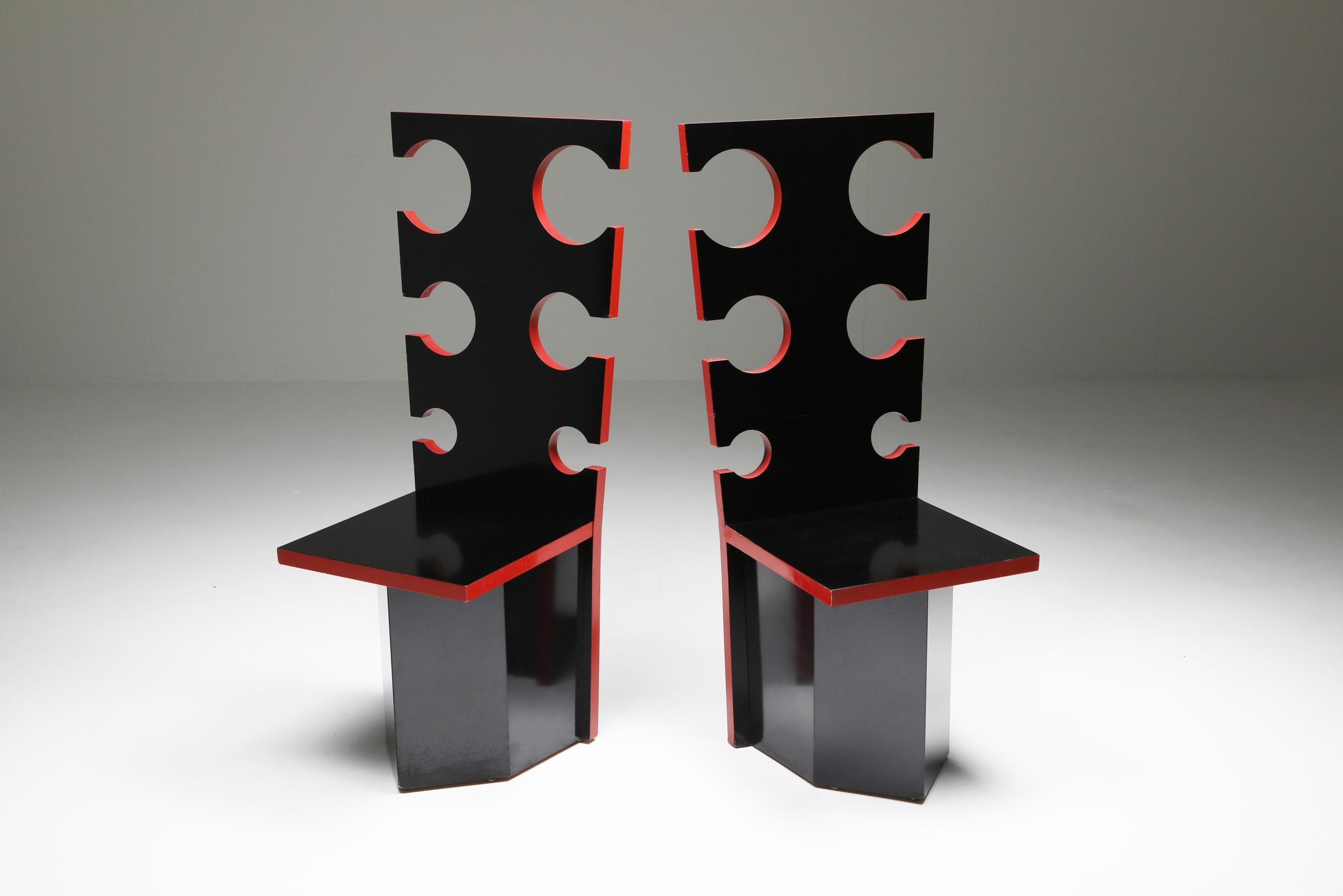Black lacquer with red edges by Max Papiri, functional art, collectible design.

Designed on request by and for the private home of Mario Sabot. The intriguing design shows straight cut-out backrests and rectangular seats on a polygonal base. The
