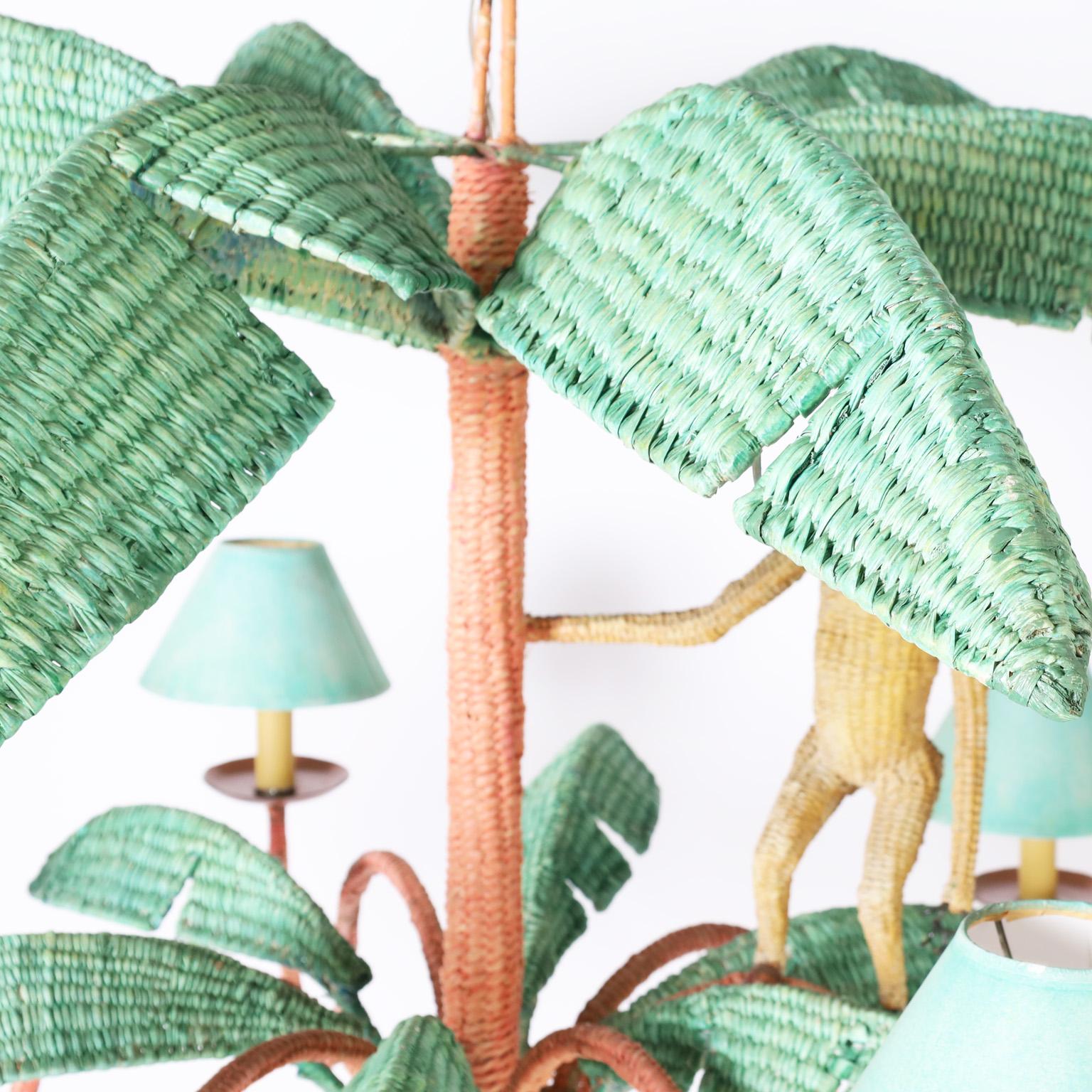 Whimsical vintage Mario Torres six light chandelier crafted with woven reed on a metal frame, painted in tropical colors with attached monkey and highlighted with copper hardware.
