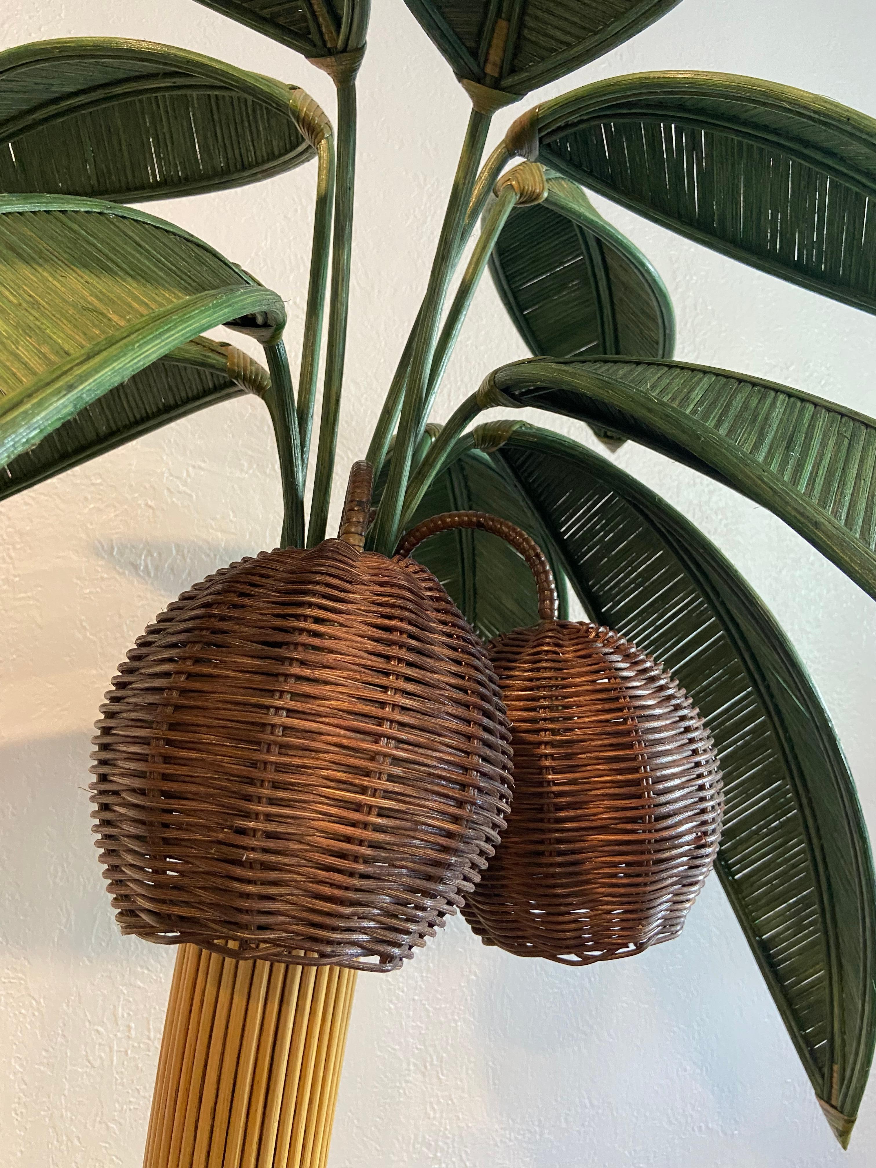 Mario Torres Lopez attributed pencil reed palm tree floor lamp. Removable/adjustable leaves allow for multiple arrangements. 

Would work well in a variety of interiors such as modern, mid century modern, Hollywood regency, etc. Piece blends