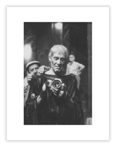 Peter O'Toole as Tiberius holding camera, Film set photograph by Mario Tursi