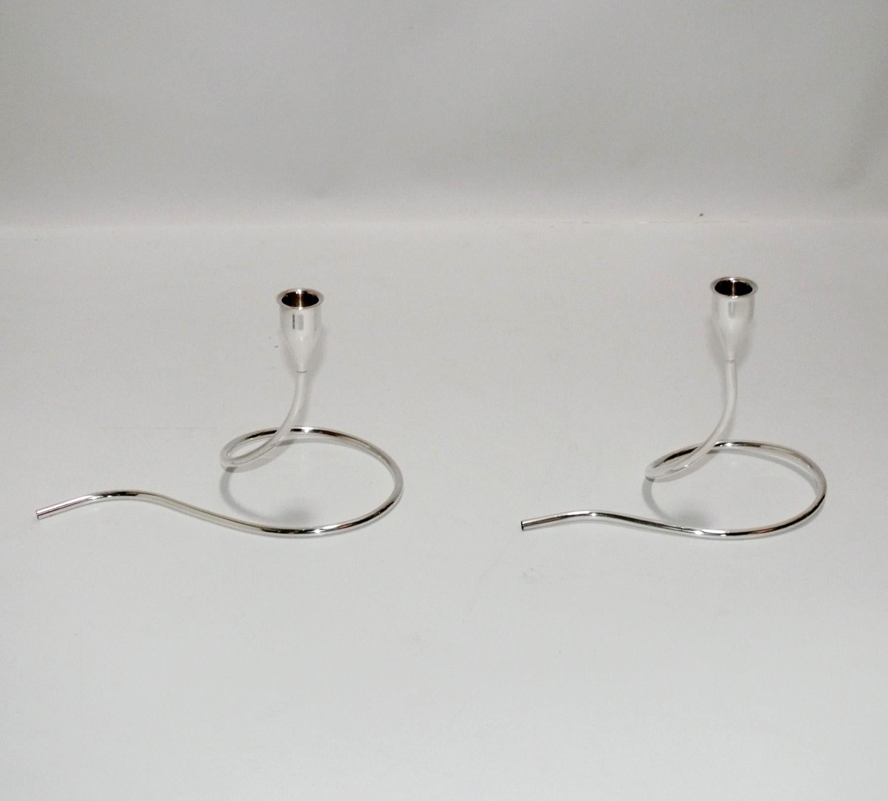 Pair of Sterling Silver Modernist candlesticks, designed by Marion Anderson Noyes for Towle Silversmiths, circa 1950s. Signed inside candle cup 