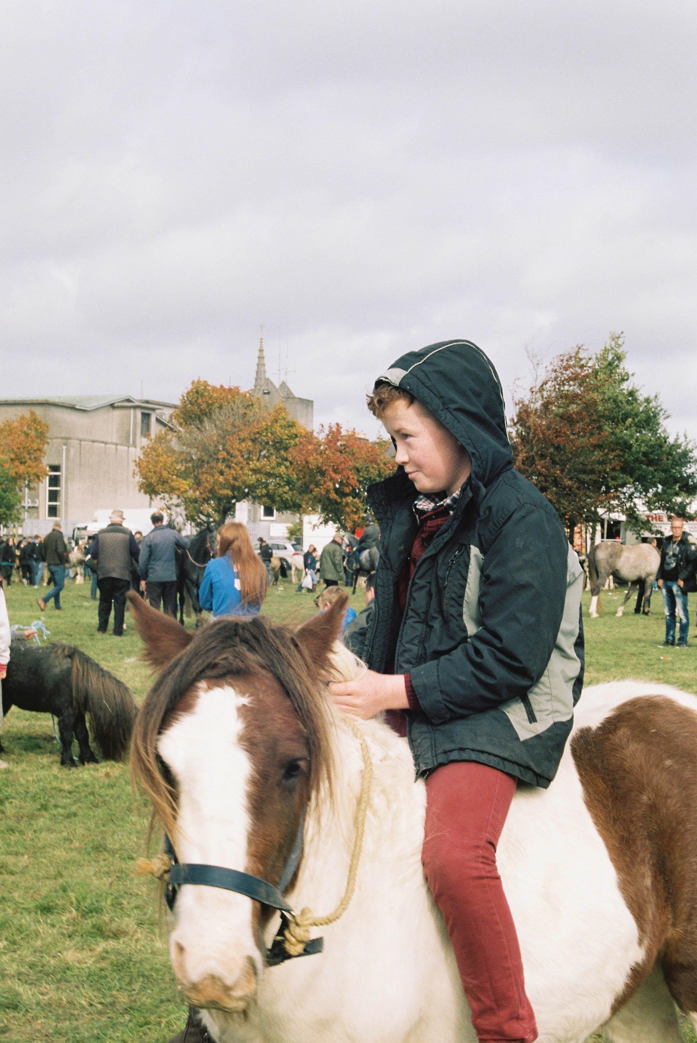 Marion Bergin Color Photograph - Boy on Horse - Ballinasloe Horse Fair, Ireland, 2018