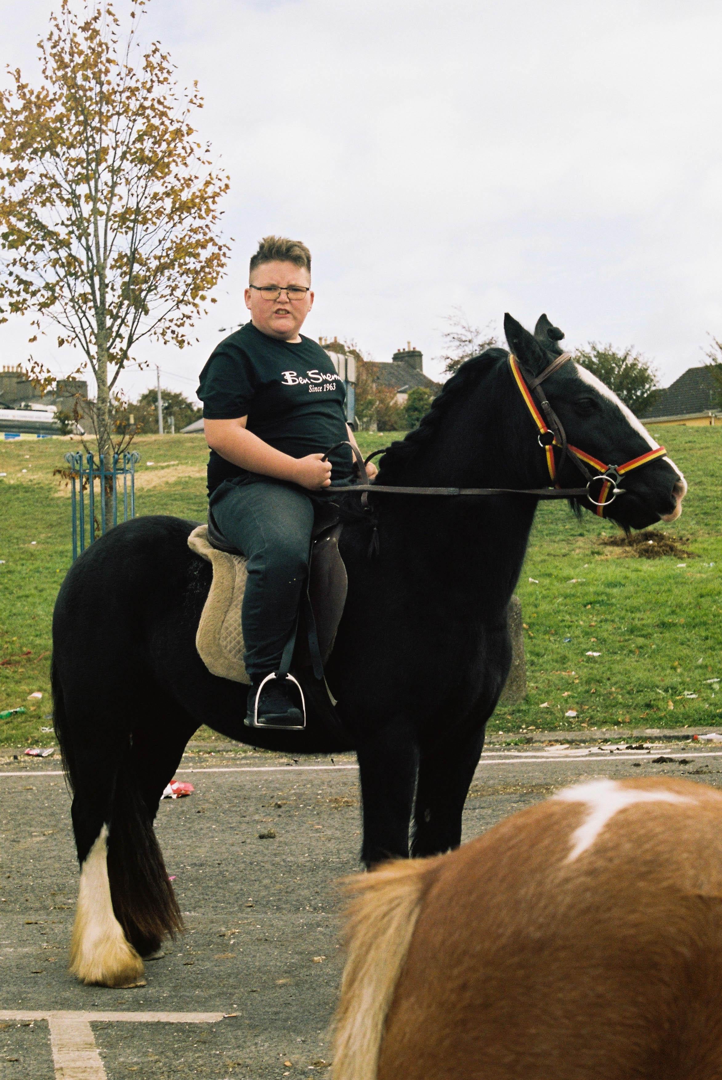Marion Bergin Animal Print - Irish Traveller Boy and Horse - Ballinasloe Horse Fair, Ireland, 2018