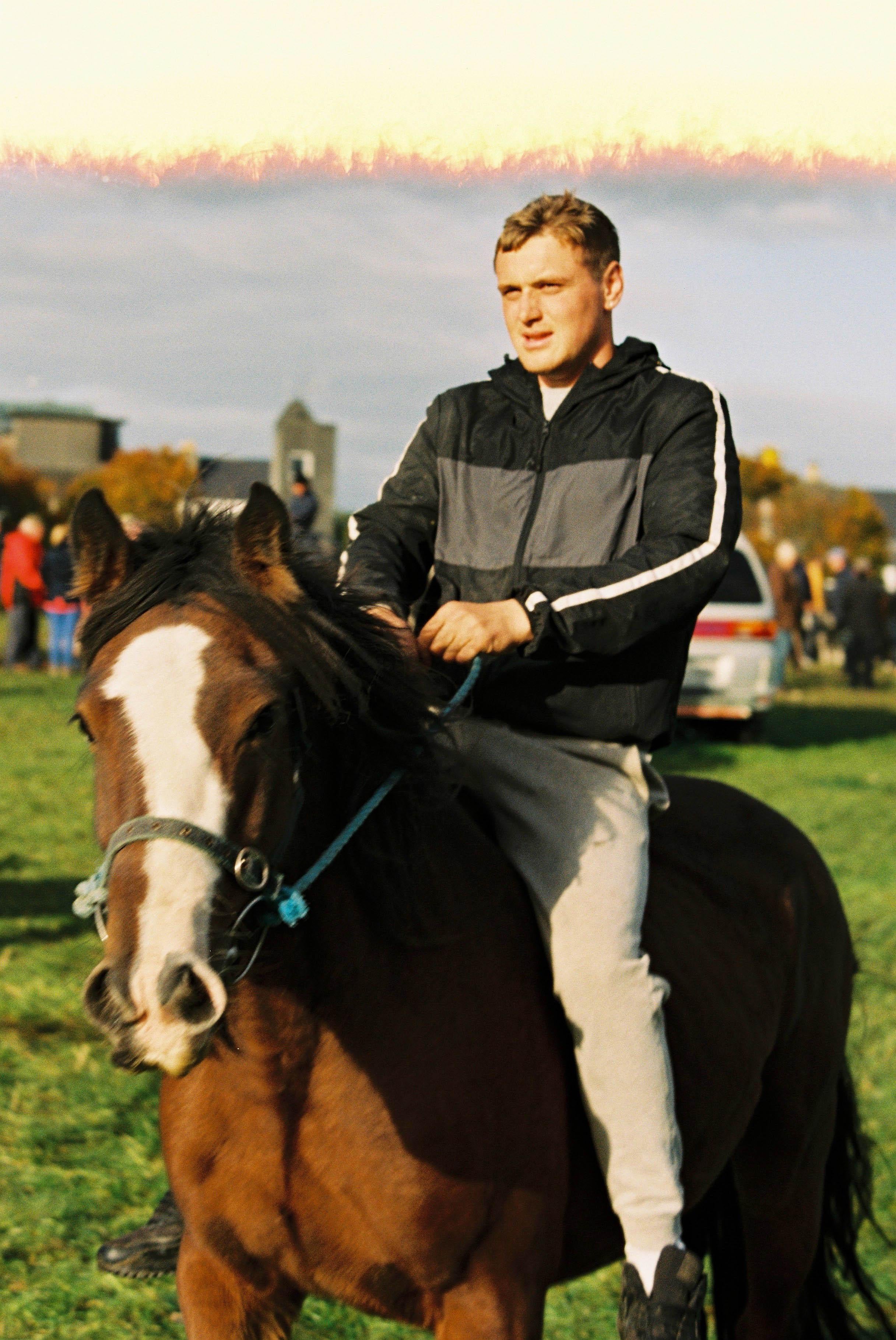Marion Bergin Color Photograph - Young man on Horse - Ballinasloe Horse Fair, Ireland, 2018