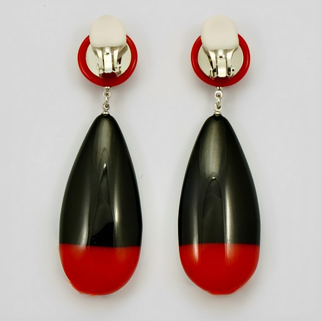 Marion Godart fantastic red and black shiny plastic drop earrings, they are clip ons. Length 8.8 cm / 3.46 inches, and maximum width 2.6 cm / 1 inch. The earrings are in very good condition. They have a lovely organic shape and feel.

These are