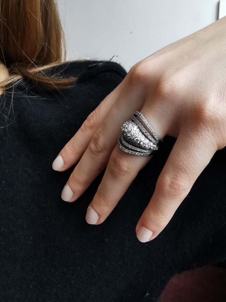 This beautiful ring from designer Marion Jeantet is composed by white diamonds, weight: 2.80carats, and 18k white gold, weight: 10.34grs
French finger size: 50                    Finger size: 5 1/4

French assay mark and signed.
Price without local