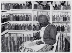 Jorena Pettway sorting peas inside her smokehouse. Gee's Bend Alabama