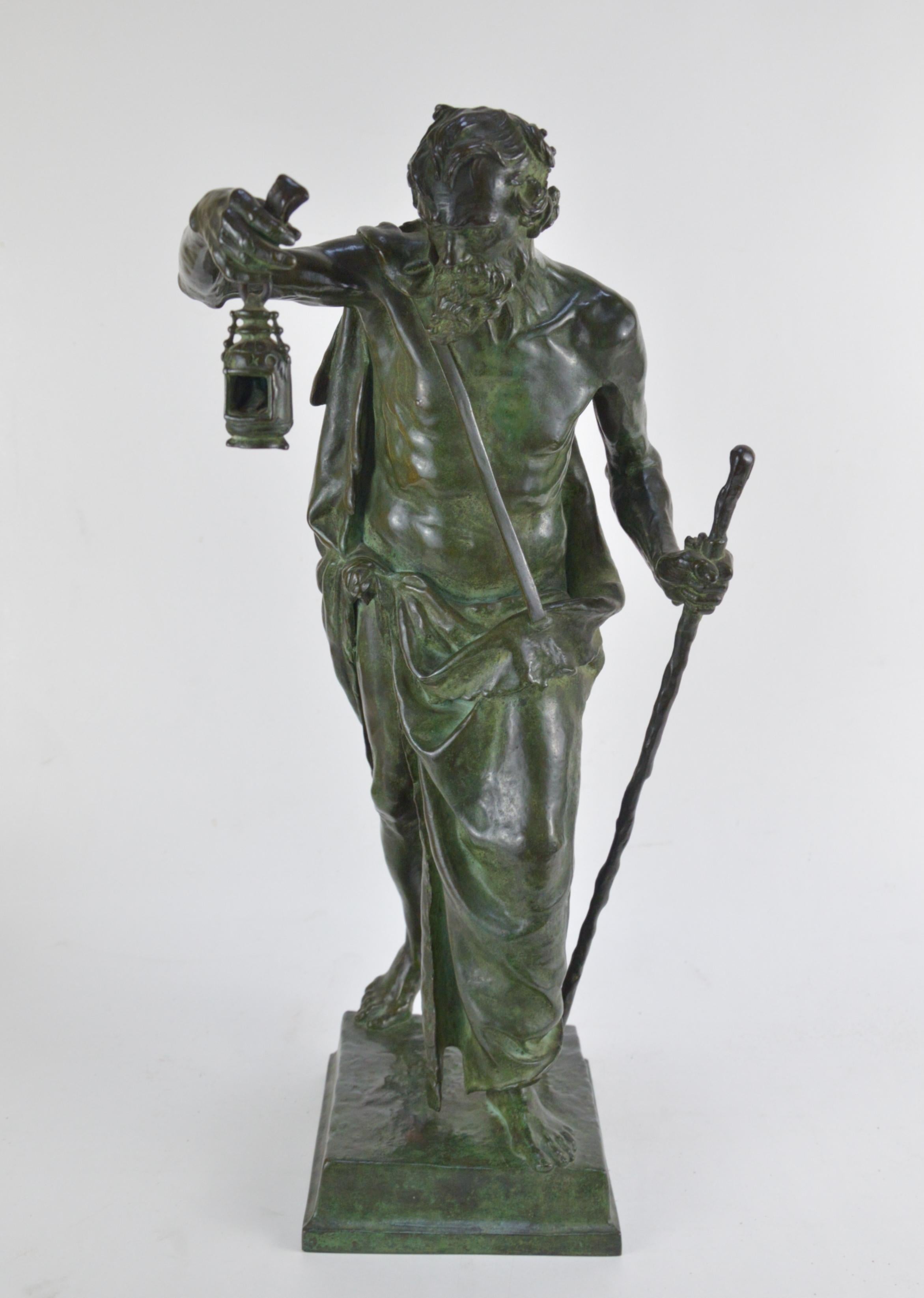 Marioton Claudius (1844-1919) Bronze statue representing Diogenes of Sinope holing a lamp.
Colin Paris foundry seal on the base. Beautiful green patina.
Measures: Height 53.5 cm.