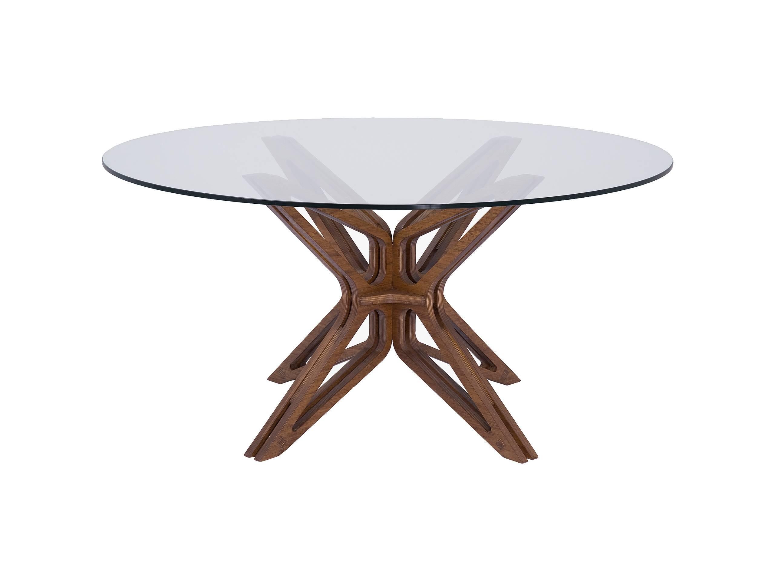 Dining table made of veneer MDF - Its final drawing is a form of open wings of a Moth (Mariposa).

Glass top not included.