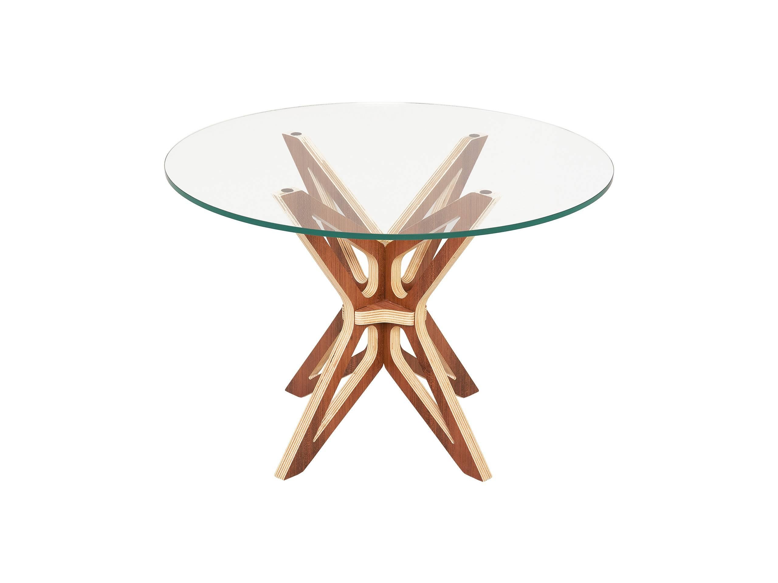 Dining table made of veneer MDF - Its final drawing s a form of open wings of a Moth (Mariposa).

Glass top not included.