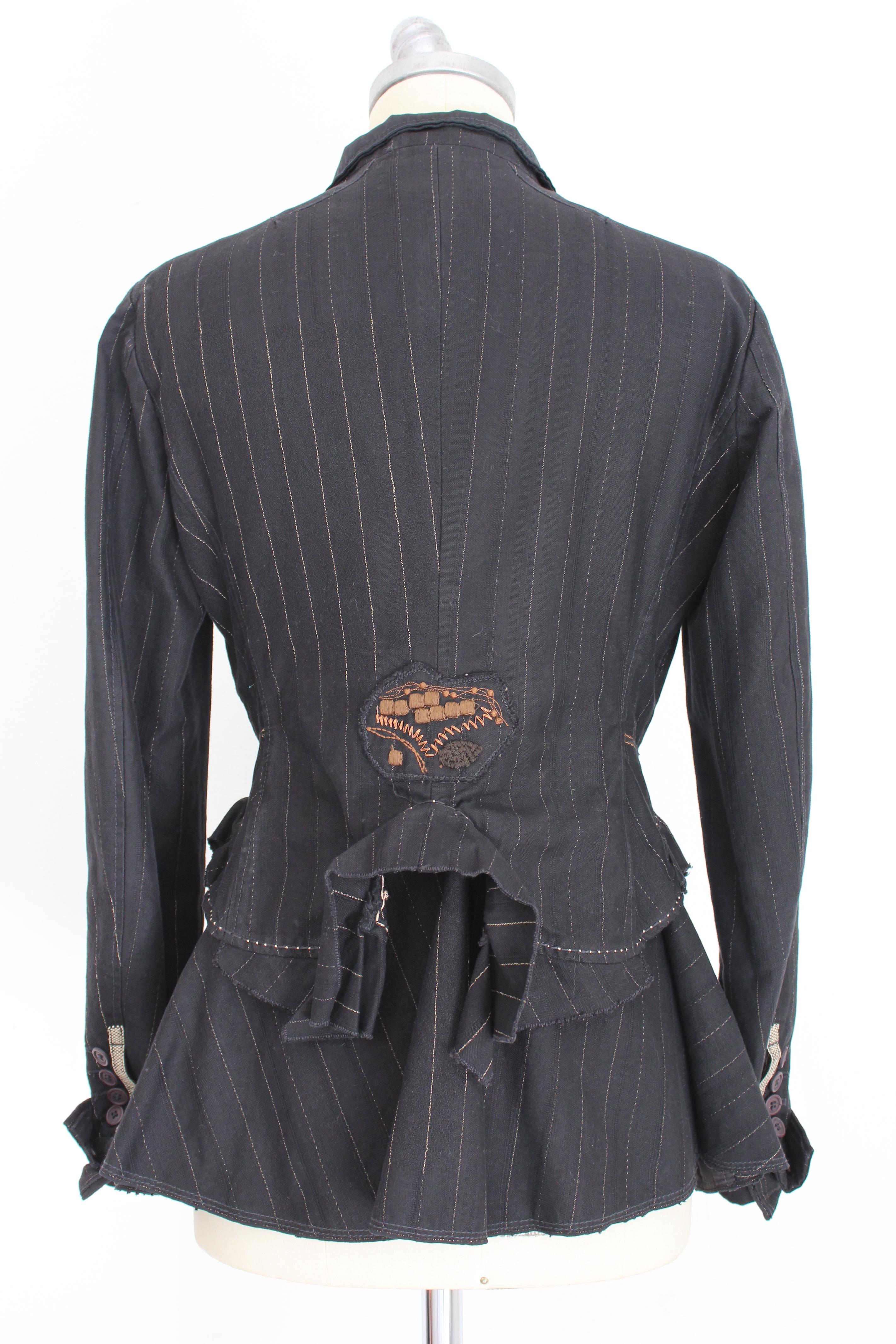 Marithe Francois Girbaud vintage 2000s women's jacket. Pinstripe blazer, black and beige. On the back of the jacket there is an embroidered application and a double layer of jacket that goes down soft. 99% cotton 1% polyester fabric, internally