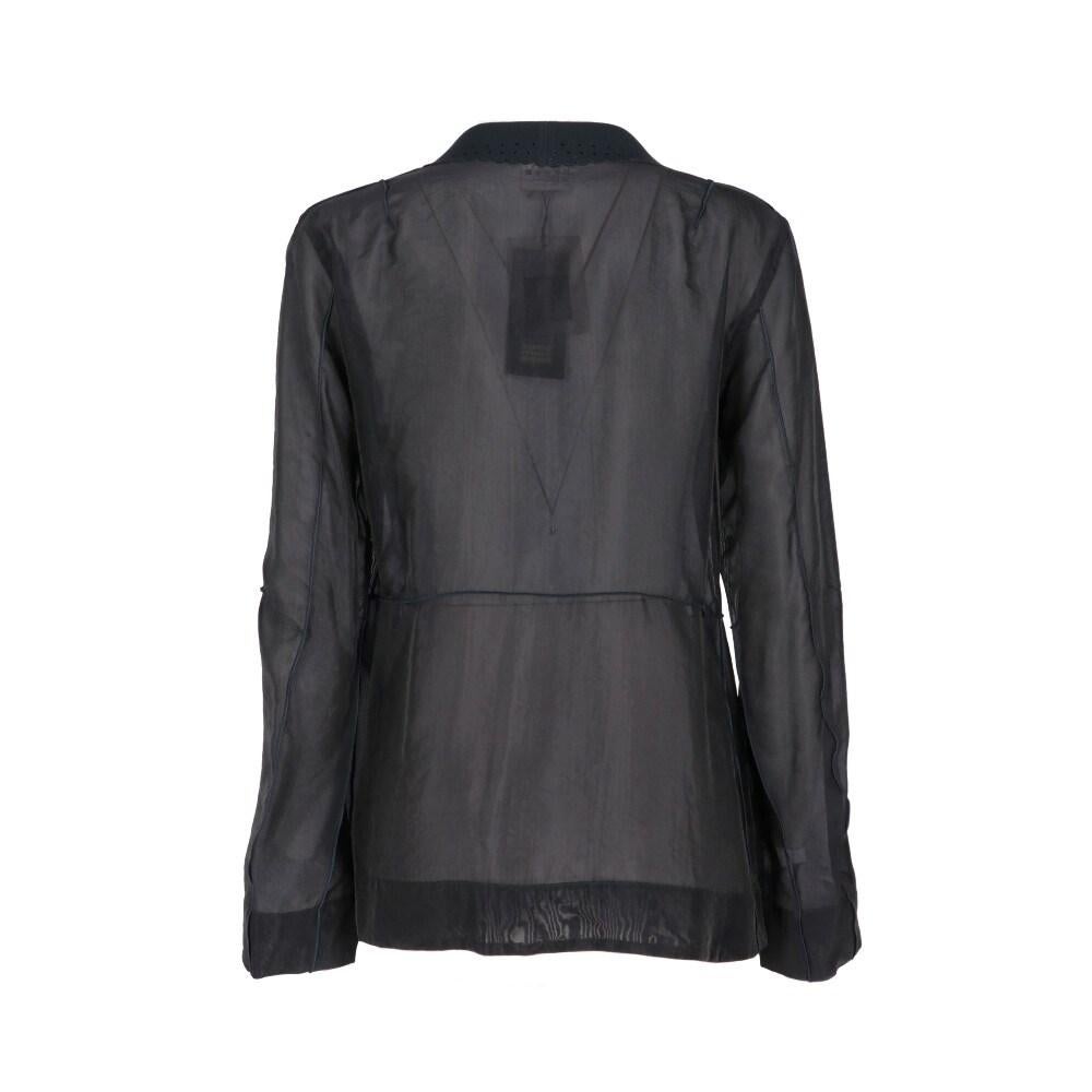 Marithé + François Girbaud midnight blue organdy 2000s blouse. Lapel collar, front buttoning and scalloped edges with laser-cut details.

Size: 44 IT

Flat measurements
Height: 70 cm
Bust: 46 cm
Sleeves: 58 cm
Shoulders: 40 cm

Product code: