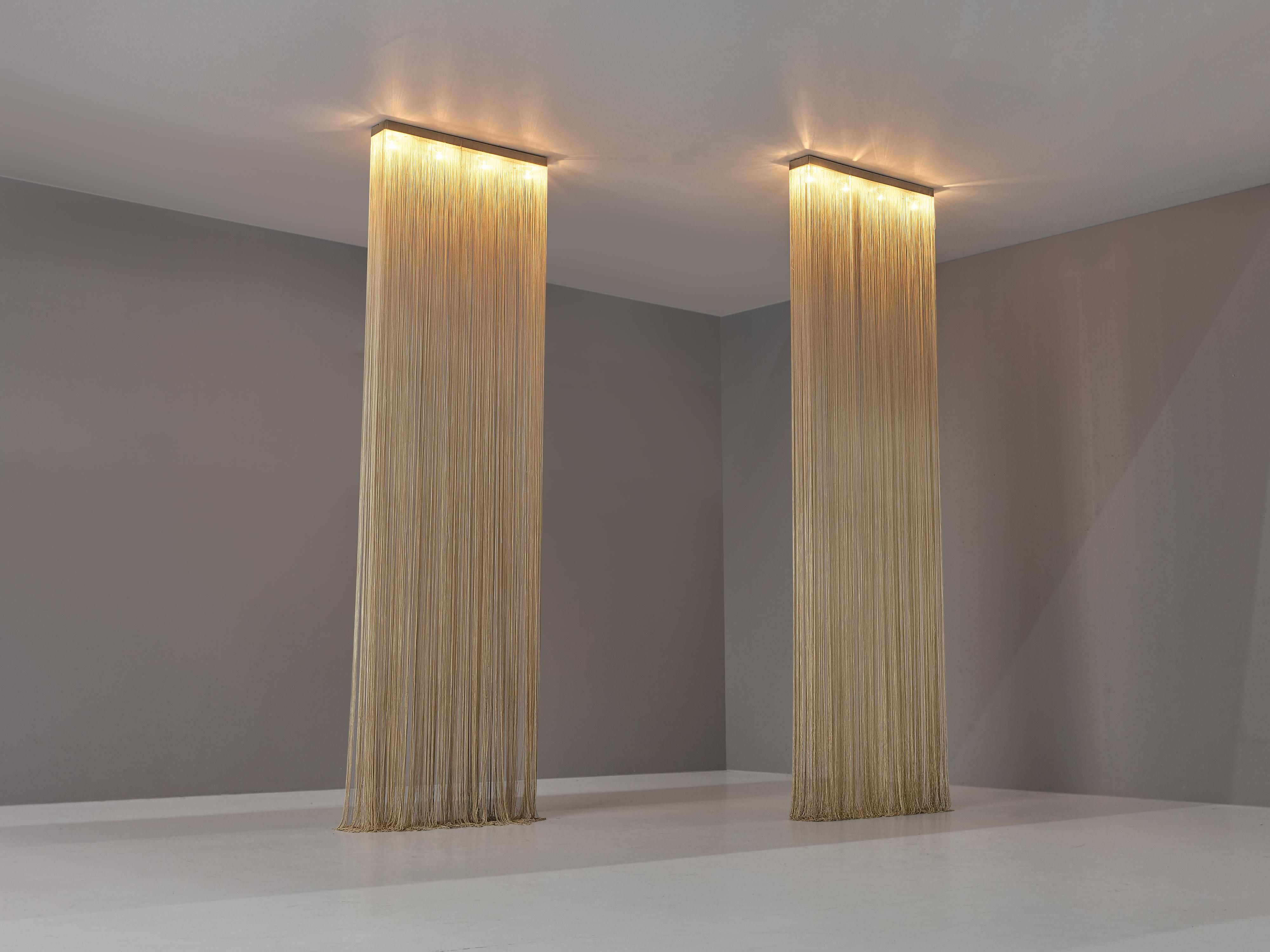 Mariyo Yagi for Syrrah, 'Garbo' chandeliers, metal, nylon, Italy, 1976

Enchanting pair of 'Garbo' fringe chandeliers designed by Japanese designer Mariyo Yagi and manufactured by Syrrah. Each mounted metal ceiling base houses four light bulbs that