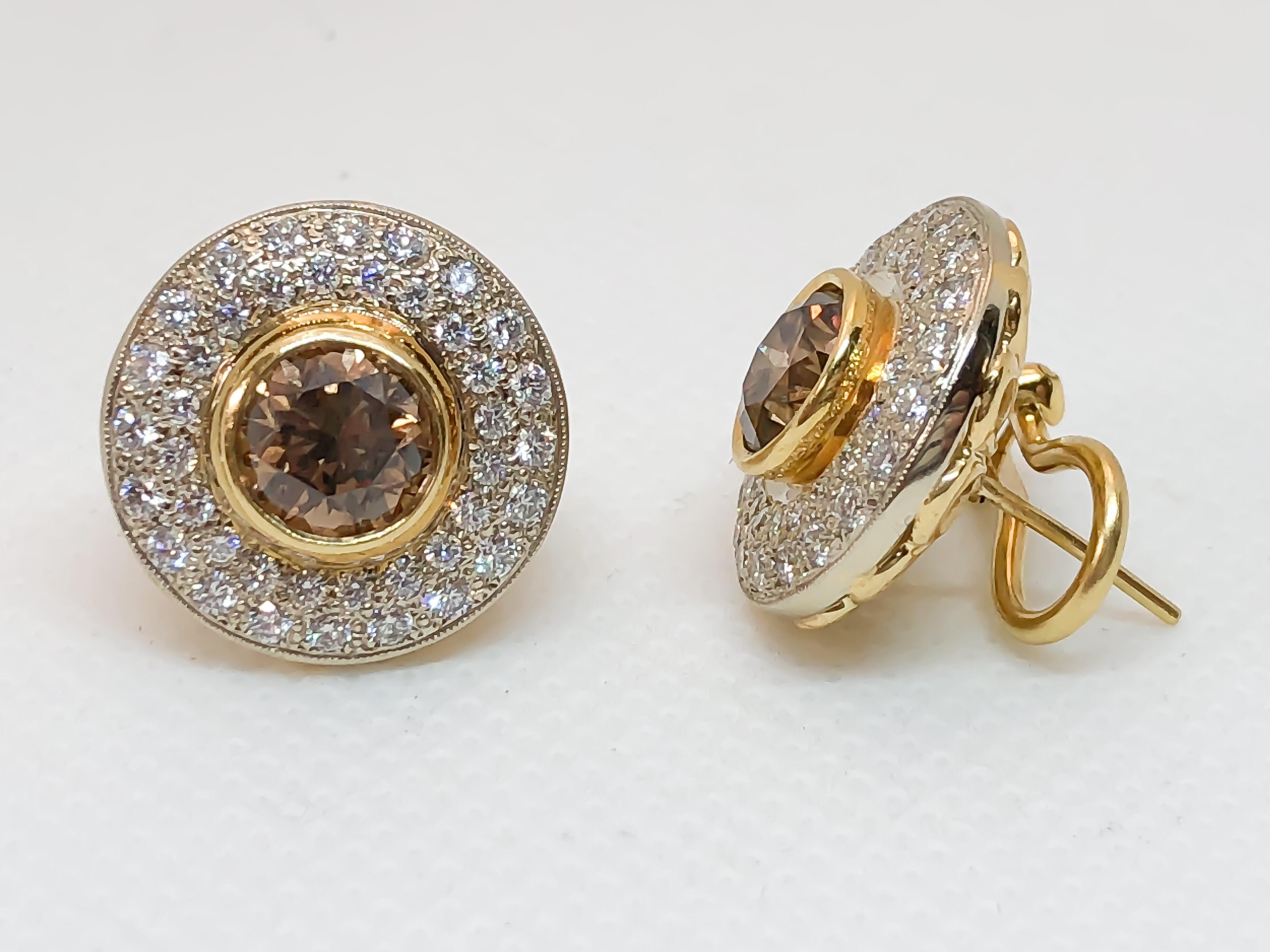 Designed and handmade by Mark Areias Jewelers. Beautiful cognac brown round brilliant cut main diamonds are bezel set in 18K yellow gold. Surrounded by two row micro pave premium white round brilliant cut diamonds in 18K white gold. The earring disc