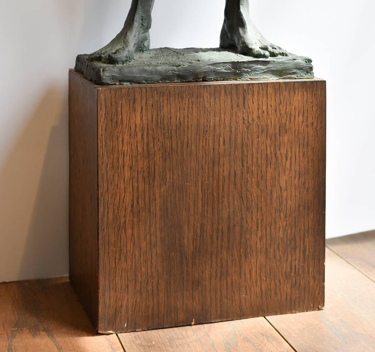 Study of Athlete (with Ball): Academic Bronze Figurative Sculpture of Nude Male by Mark Beard
modern figurative bronze sculpture of a nude athlete 
32 x 11 x 5 inches, verdegris patina
Base measures 11 x 11  7 inches

This figurative bronze