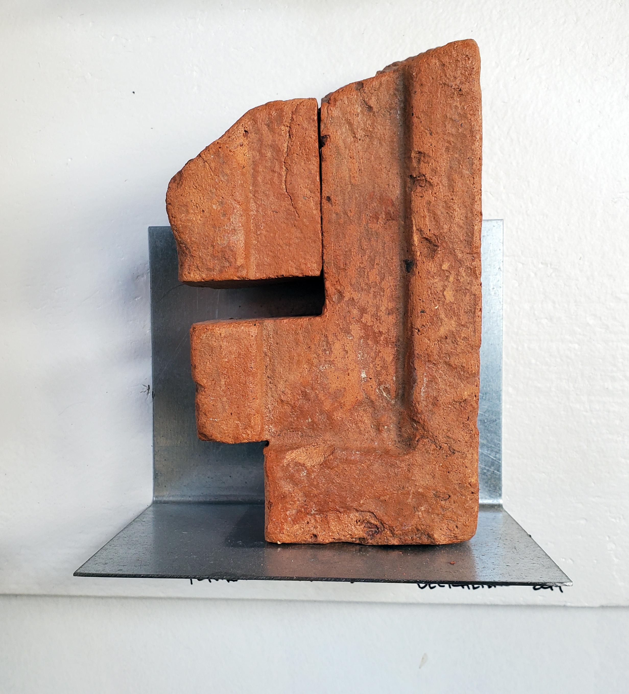 Compelling wall relief sculpture creates artistic puzzle, 