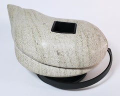 Sculpted stone and steel art titled "Insider series, Fish Spin"