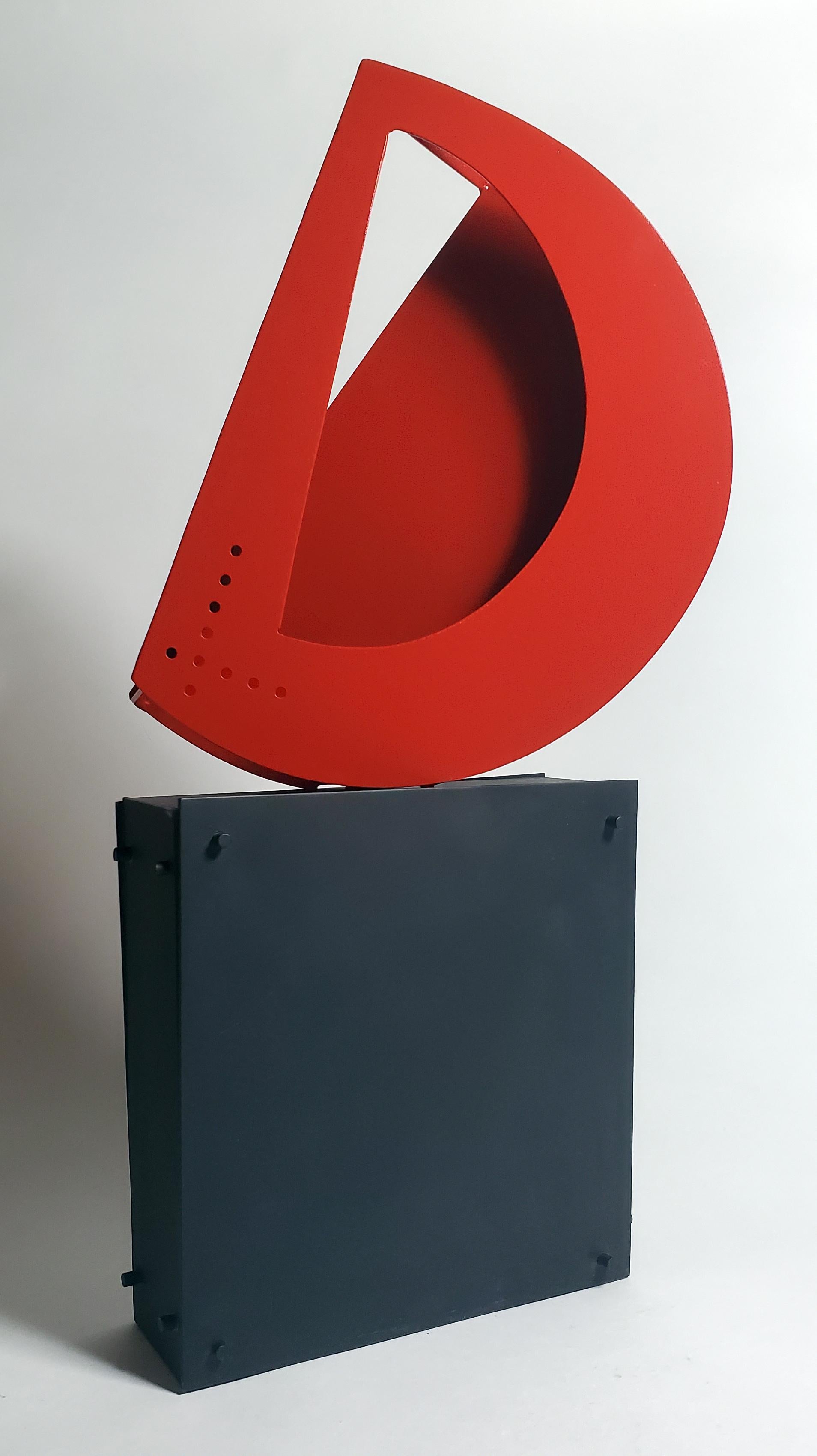Dynamic red sculpture embracing the principles of Constructivism, "The New D"