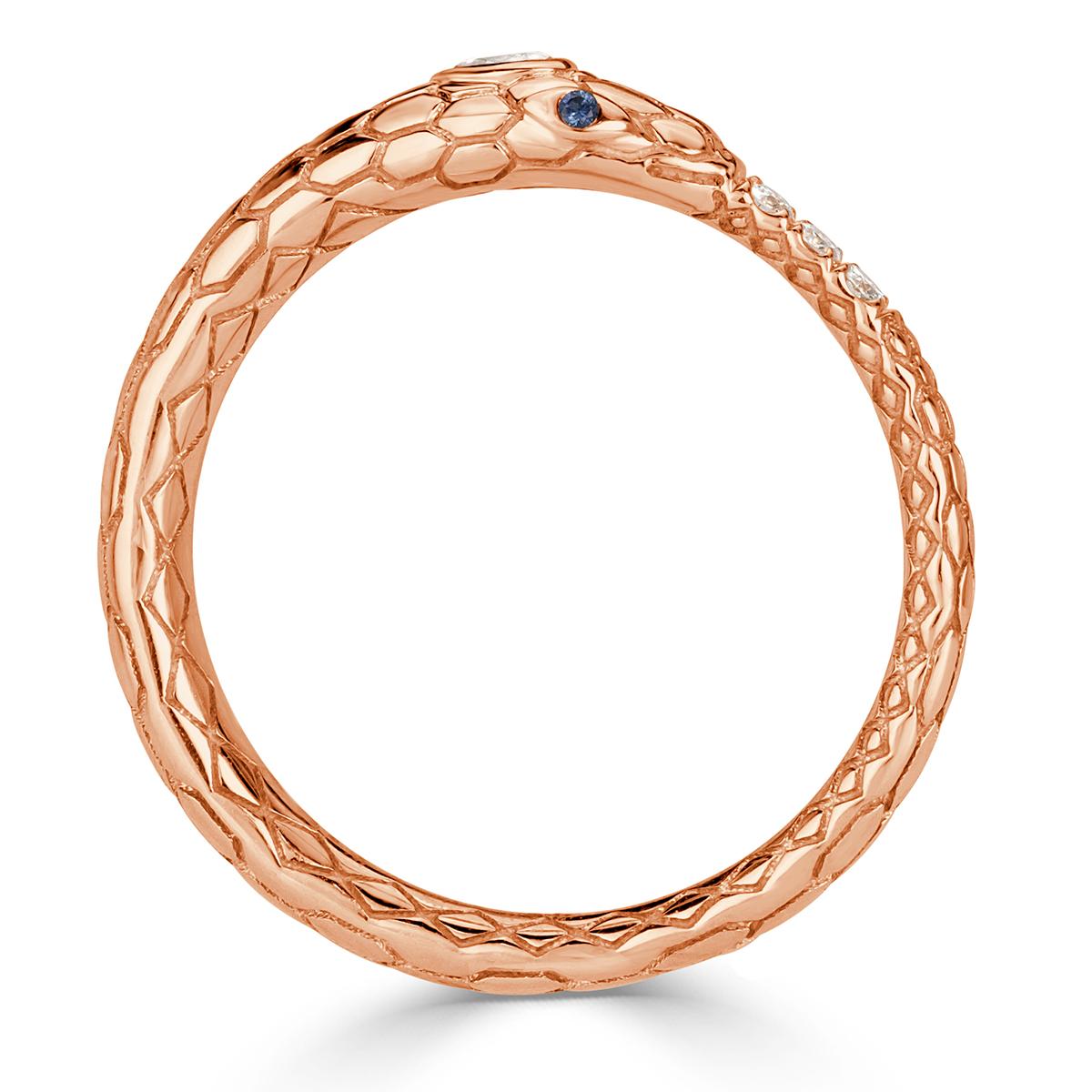Created in 14k rose gold, this ravishing diamond and tourmaline ring showcases a stunning ouroboros design embelished with 0.05ct of pear shaped and round brilliant cut diamonds as well as 0.02ct of round cut sapphires. You can choose different gems
