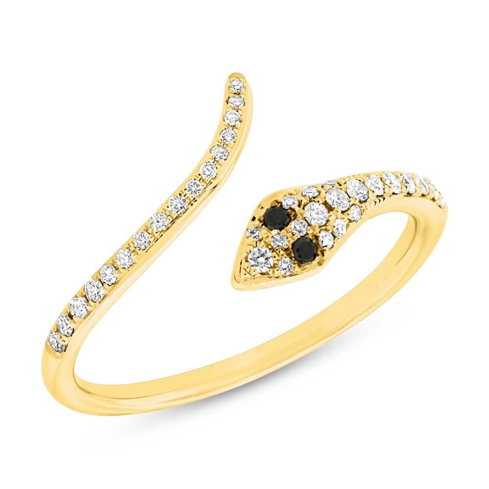 This lovely diamond ring showcases an exquisite snake design accented with 0.20ct of white and fancy black round brilliant cut diamonds. They are set in 14k yellow gold.
