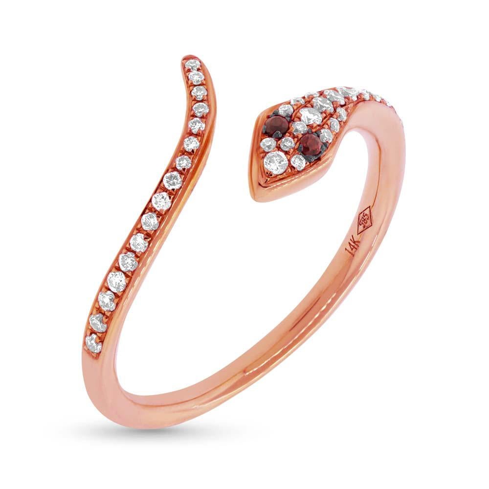 This lovely diamond ring showcases an exquisite snake design accented with 0.19ct of round brilliant cut diamonds and 0.03ct of rubies. They are set in 14k rose gold.
