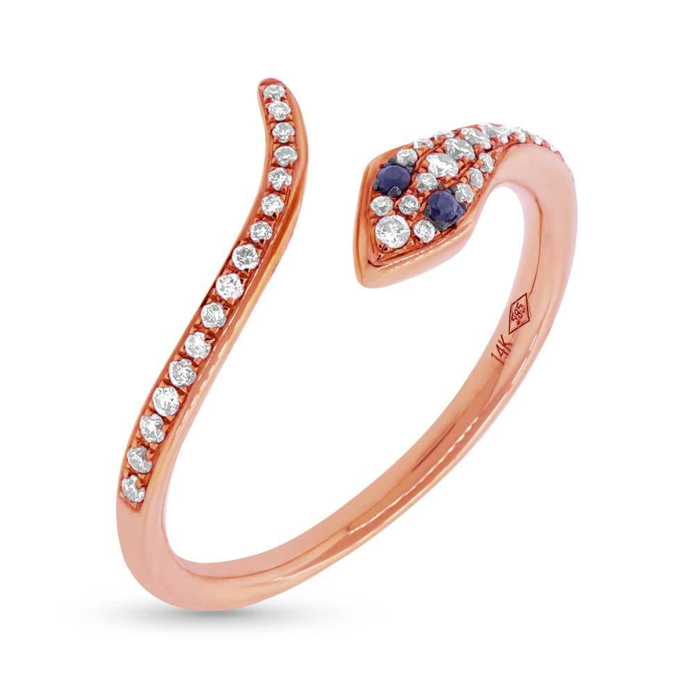 Handcrafted in 14k rose gold, this ravaishing snake ring showcases 0.19ct of peerless white round brilliant cut diamonds as well as 0.03ct of blue sapphires. The diamonds are graded at F-G, VS2-SI1.
