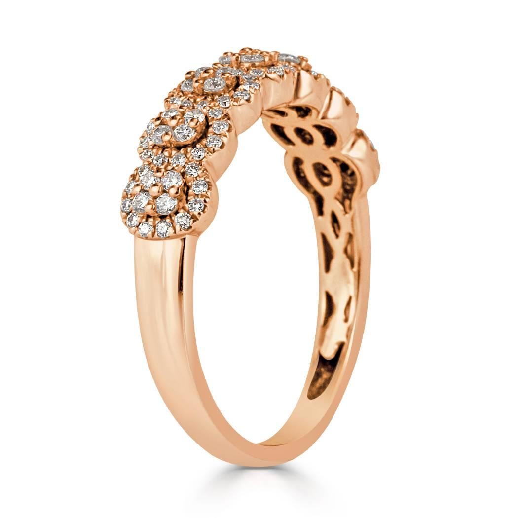 This gorgeous right-hand ring features 0.45ct of round brilliant cut diamonds graded at F-G, VS2-SI1. They are set in a custom, 14k rose gold setting.