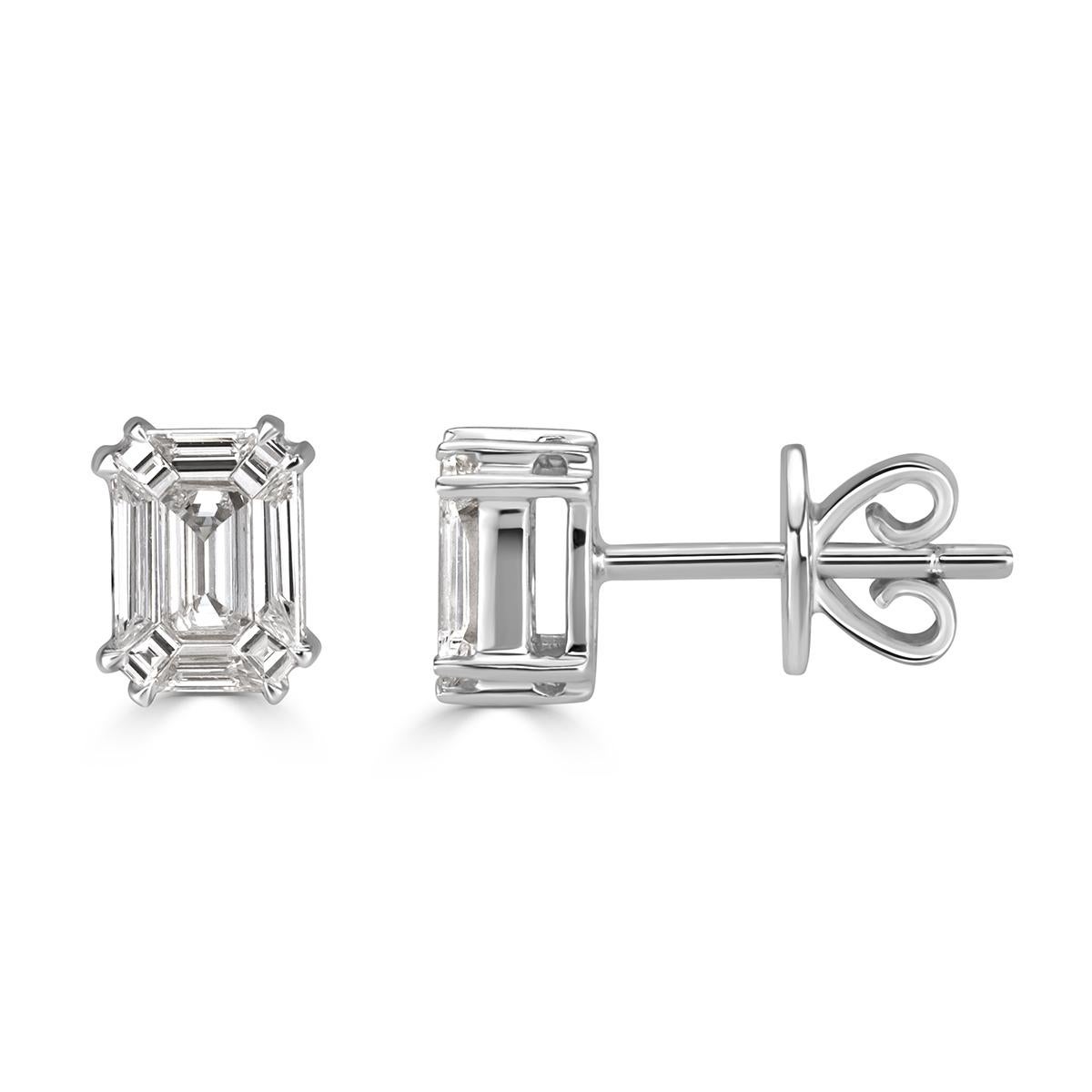 This ravishing pair of diamond stud earrings features two gorgeous emerald cut diamonds with a total weight of 0.48ct and measuring 6.00 x 4.60m. They are graded at E-F, VS1-VS2 and set in high polish 18k white gold.
