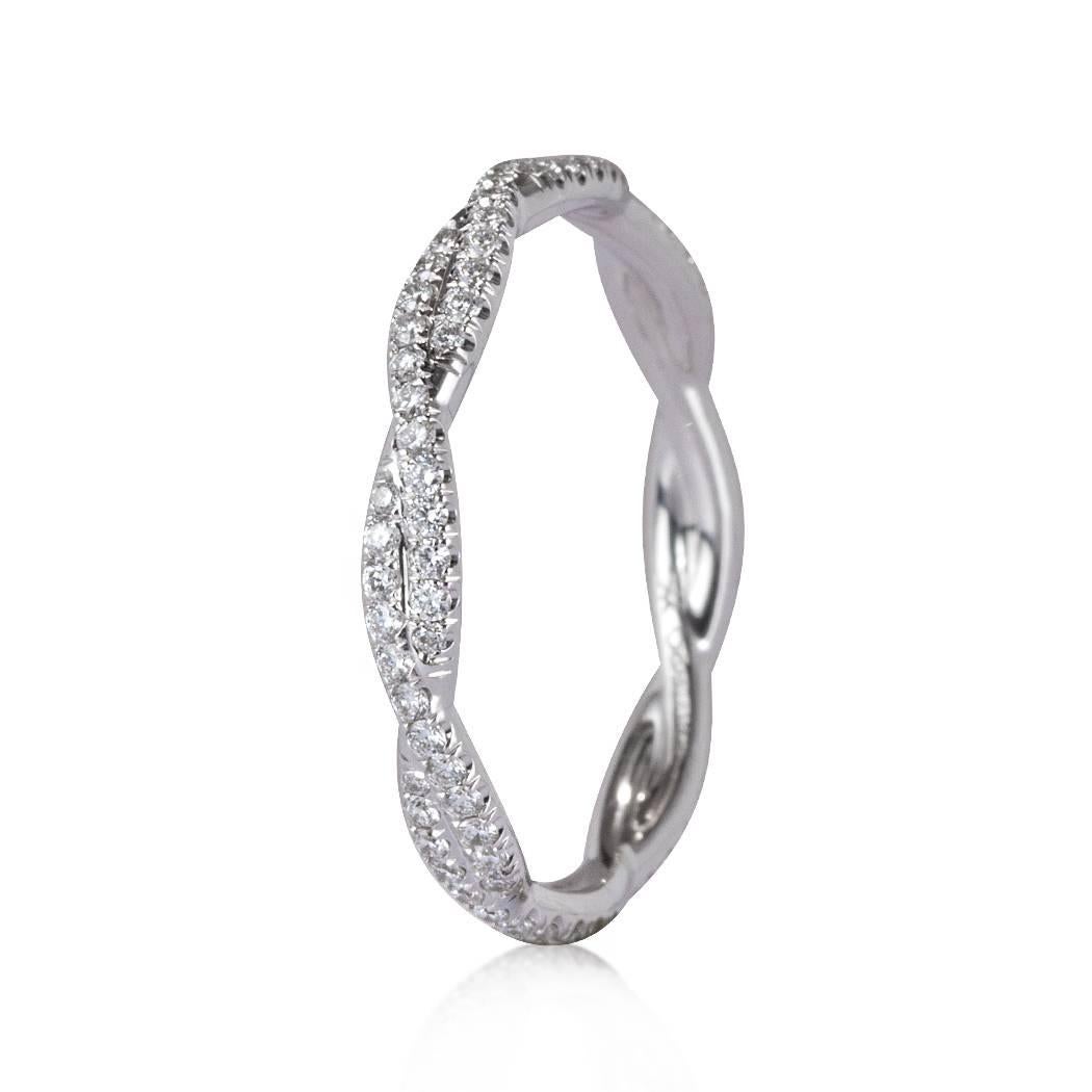 This versatile eternity band is set with 0.35ct of round brilliant cut diamonds graded at E-F, VS1-VS2. They are beautifully matched and micro pavé set in 18k white gold. All eternity bands are shown in a size 6.5. We custom craft each eternity band