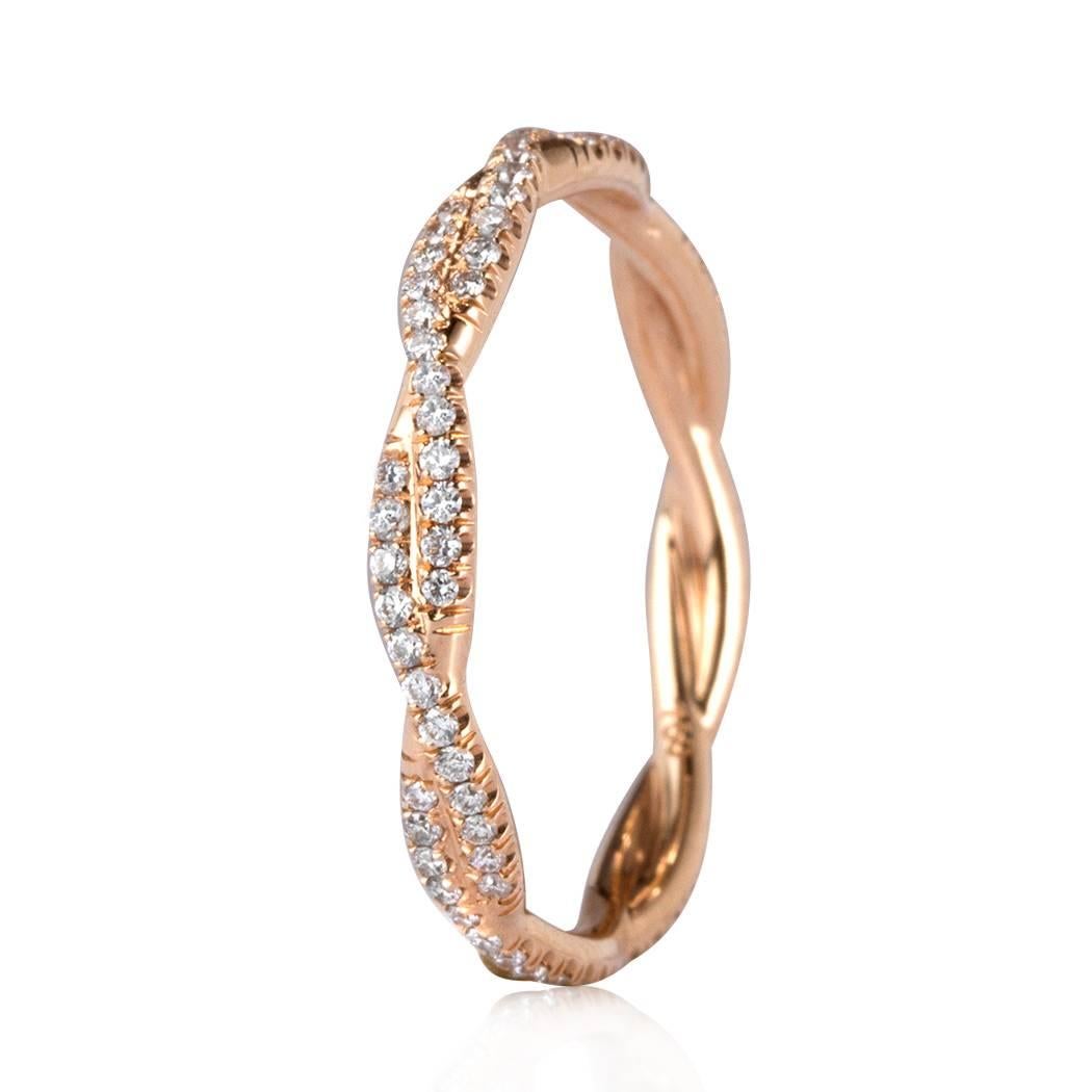 This feminine diamond eternity band is set with 0.50ct of round brilliant cut diamonds graded at E-F, VS1-VS2. They are perfectly matched and set in 18k rose gold. All eternity bands are shown in a size 6.5. We custom craft each eternity band and
