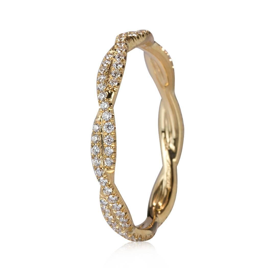 This feminine diamond eternity band is set with 0.35ct of round brilliant cut diamonds graded at E-F, VS1-VS2. They are perfectly micro pavé set in 18k yellow gold. All eternity bands are shown in a size 6.5. We custom craft each eternity band and