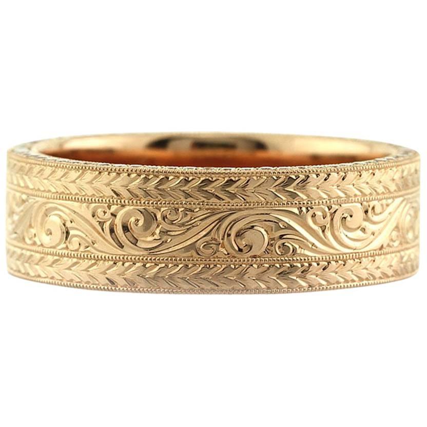 Mark Broumand 0.60 Carat Round Brilliant Cut Diamond Men
s Engraved Wedding Band