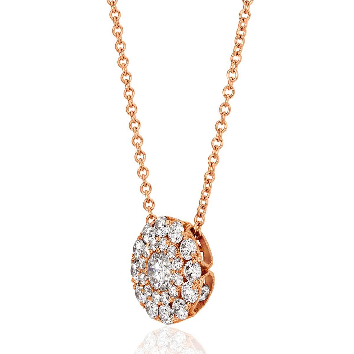 Handcrafted in 14k rose gold, this ravishing diamond pendant features 0.94ct of round brilliant cut diamonds micro pavé set in a graduating halo design. The diamonds are graded at E-F in colors and VS1-VS2 in clarity. Absolutely perfect to wear for