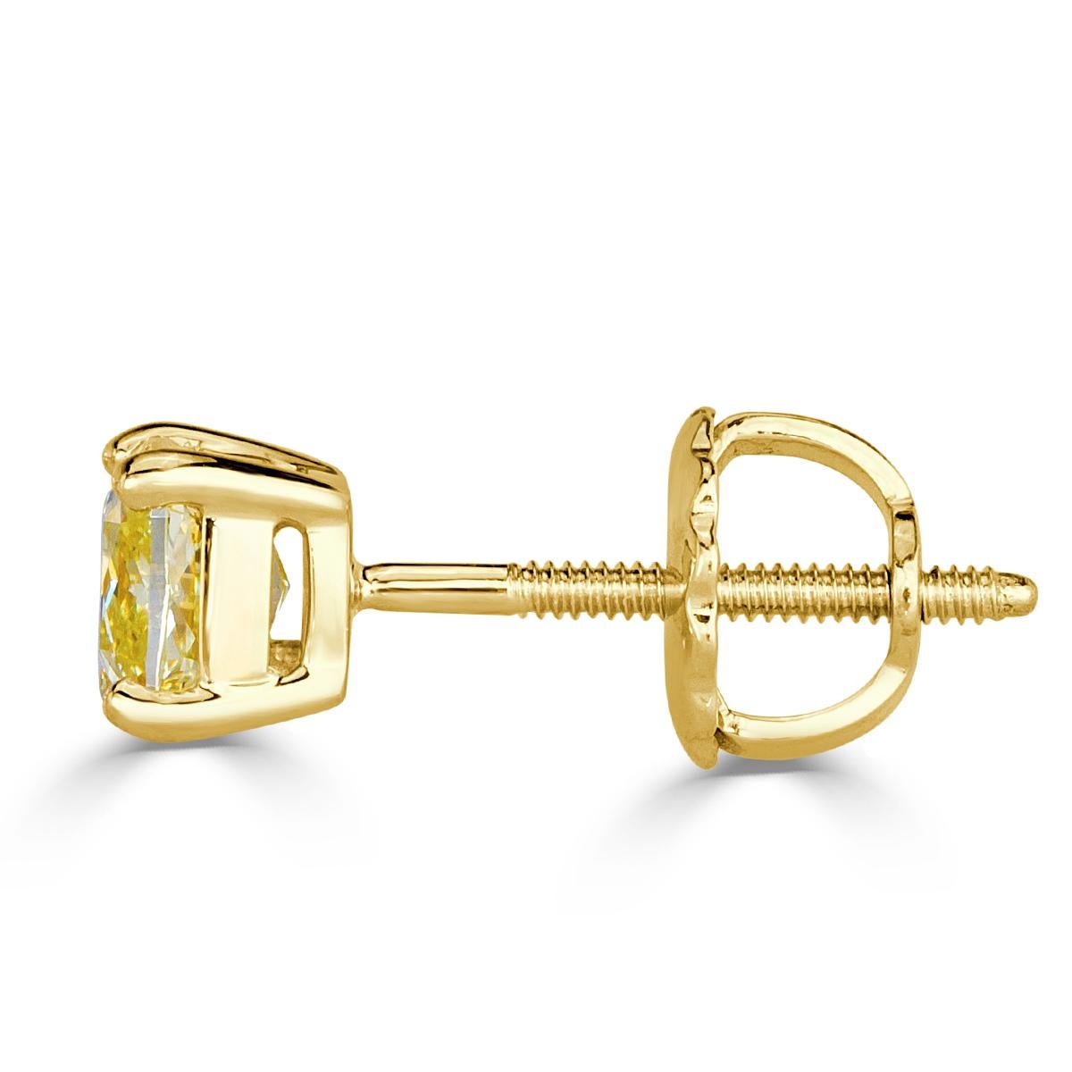 Handcrafted in 18k yellow gold, this lovely pair of diamond stud earrings showcases two cushion cut diamonds with a total weight of 1.00ct. They are graded at Fancy Yellow, VS1-VS2.