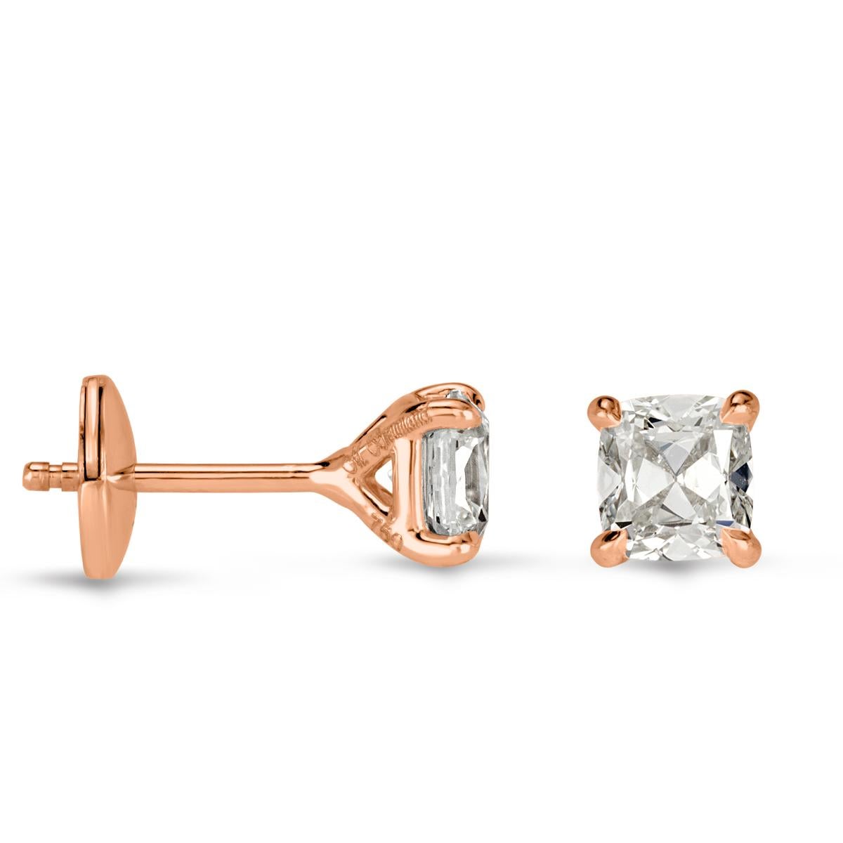 This stunning pair of diamond stud earrings showcases two ravishing old Mine cut diamonds with a total weight of 1.00ct. They are graded at F-G in color, VS1-VS2 in clarity and set in a classic four prong, 18k rose gold setting.
