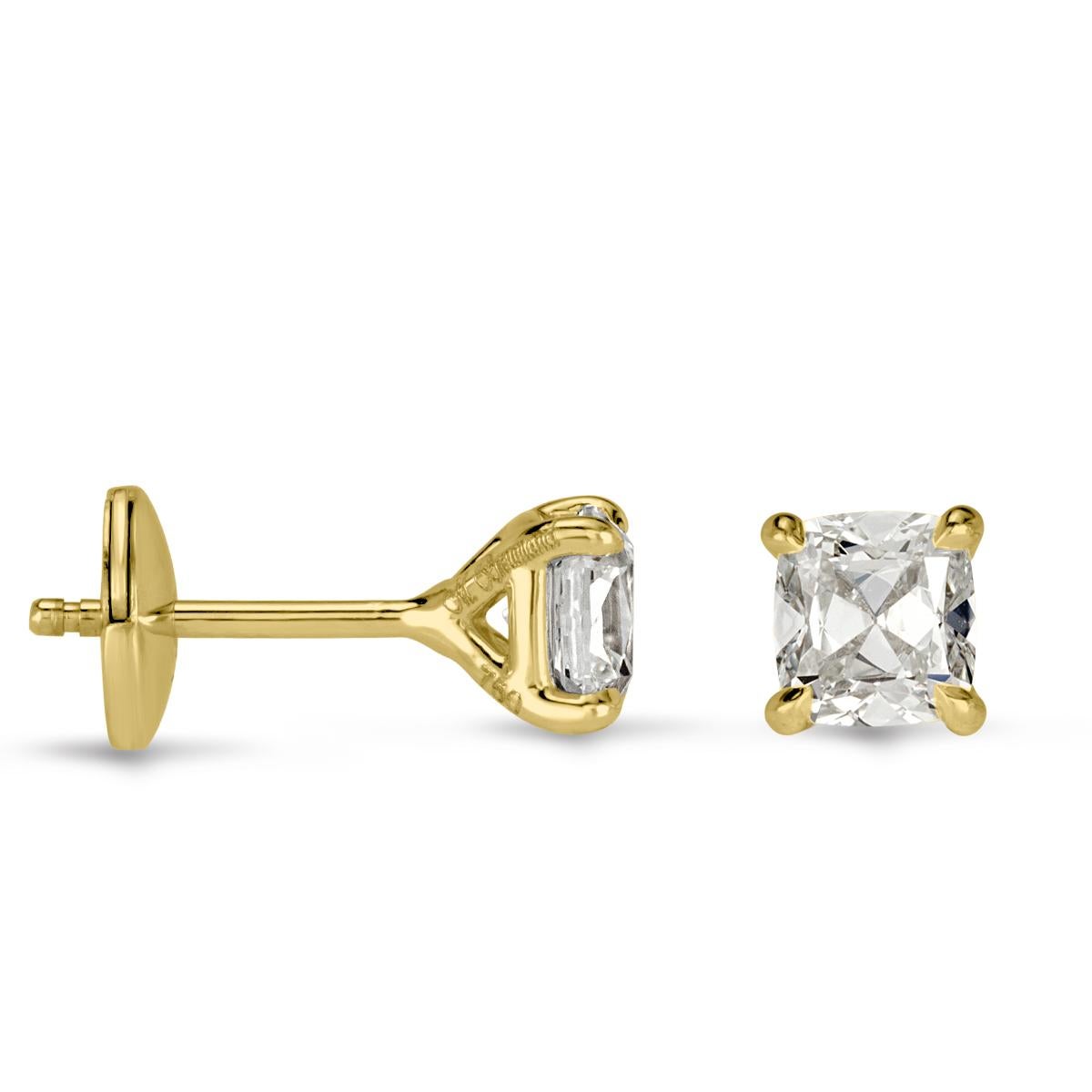Handcrafted in 18k yellow gold, this gorgeous pair of diamond stud earrings showcases two old Mine cut diamonds graded at F-G in color, VS1-VS2 in clarity. They are truly perfect for everyday wear!
