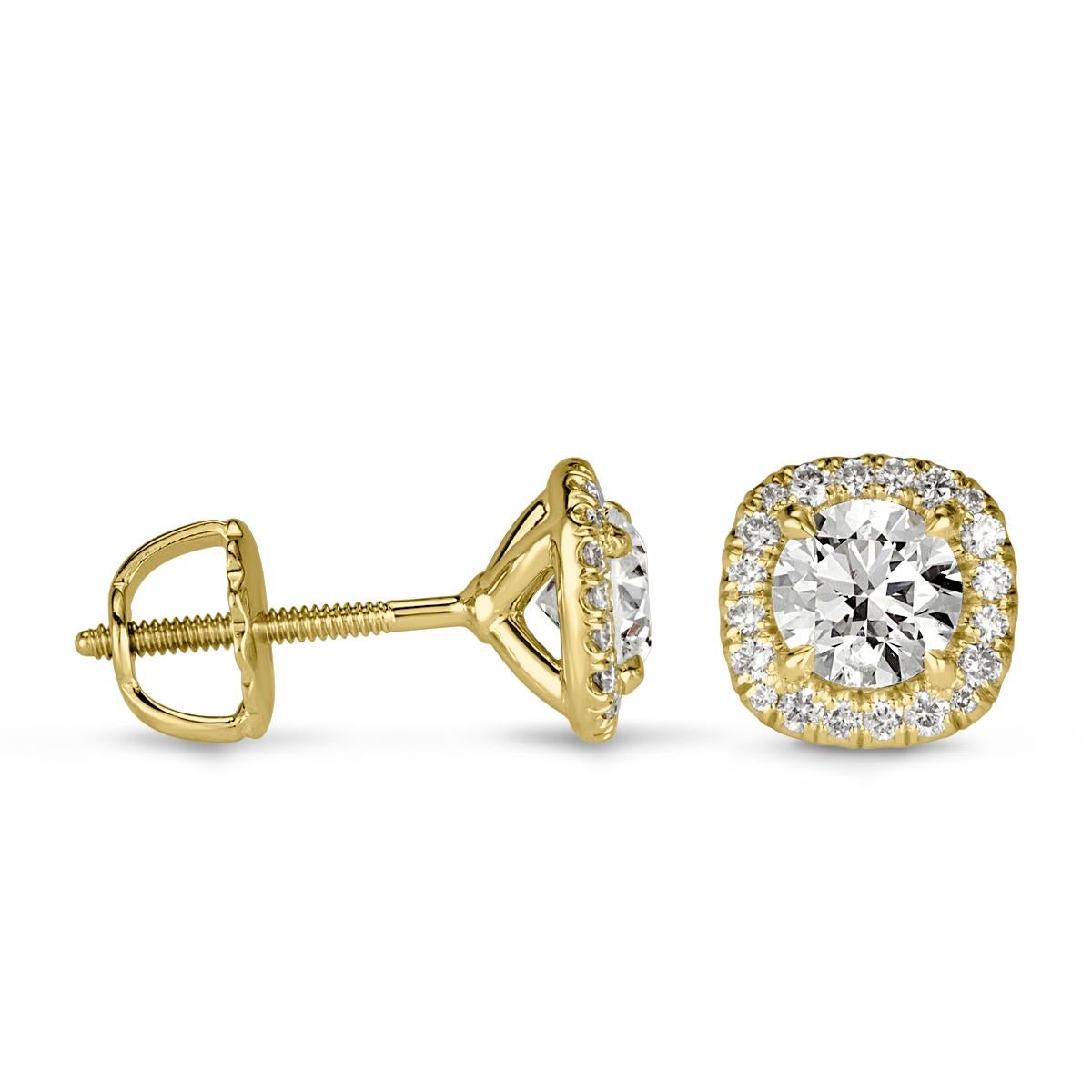 Created in 18k yellow gold, this ravishing pair of diamond stud earrings showcases two round brilliant cut center diamonds each complimented by a micro pavé halo. The diamonds total 1.00ct in weight and are graded at E-F, VS1-VS2.
