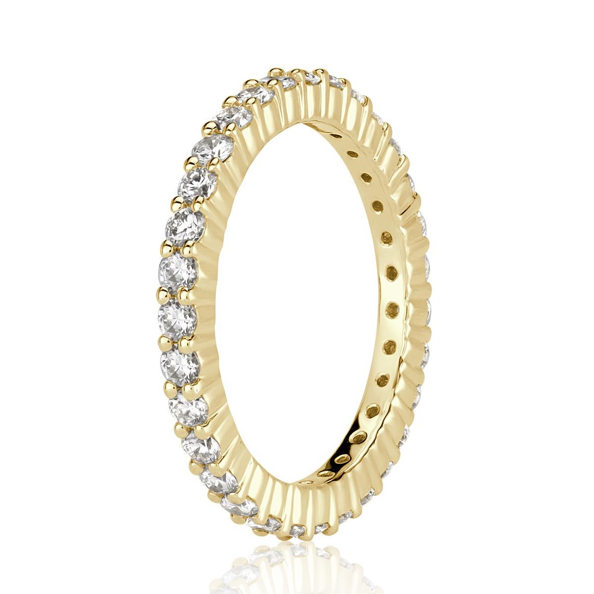 Exquisitely handcrafted in our custom 18k yellow gold, this lovely diamond eternity band features 1.00ct of seamlessly matched round brilliant cut diamonds graded at premium qualities of E-F in color, VS1-VS2 in clarity. All eternity bands are shown