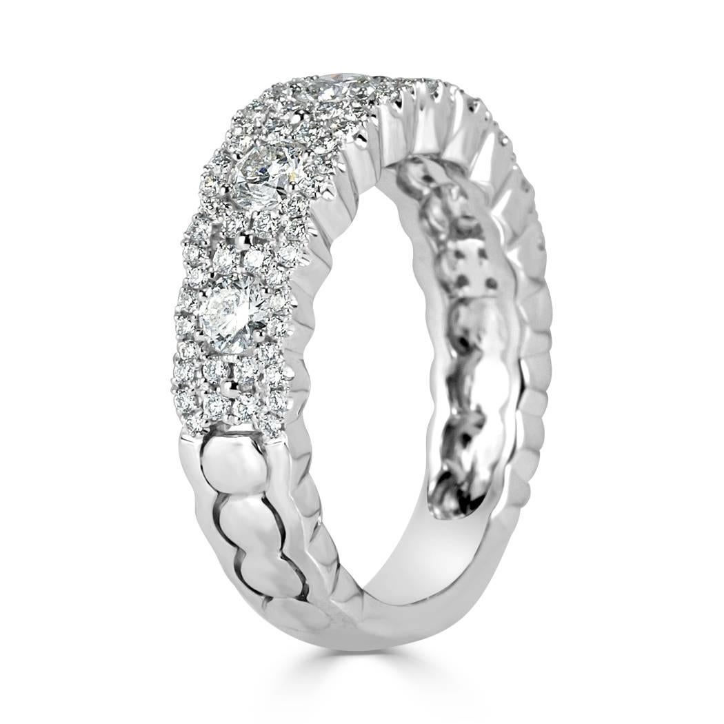This beautiful right-hand ring showcases 1.05ct of round brilliant cut diamonds graded at E-F in color, VS1-VS2 in clarity. They are impeccably matched and hand set in 14k white gold. Absolutely perfect for everyday wear!