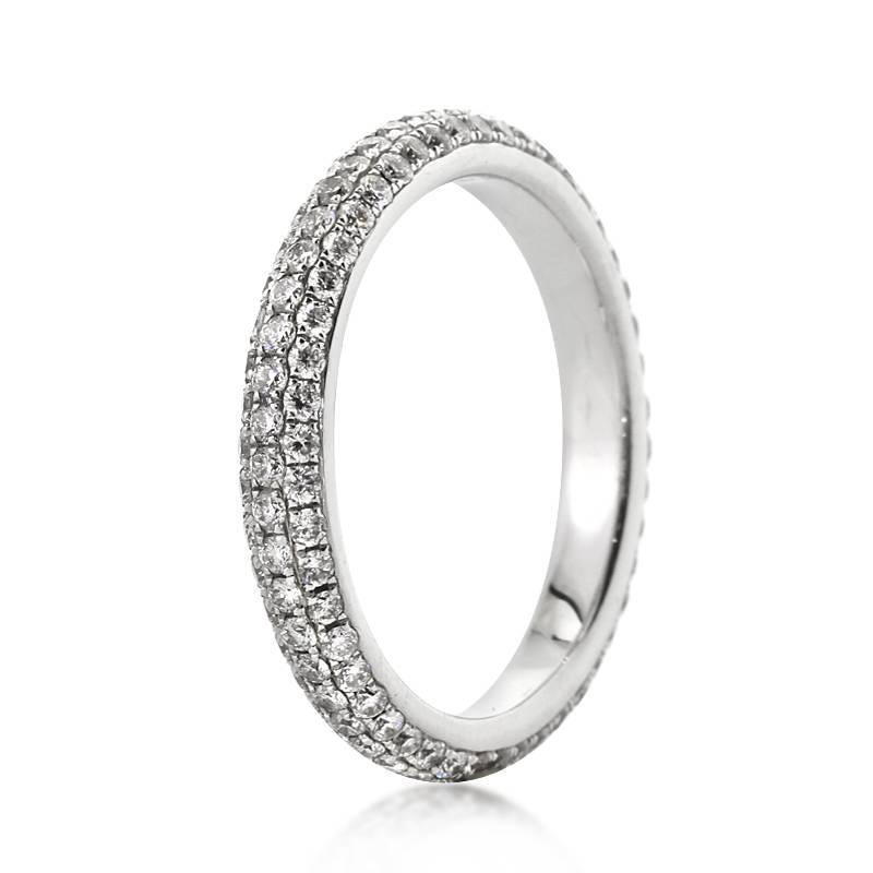 This beautiful diamond eternity band showcases three rows of round brilliant cut diamonds hand set in 18k white gold. The diamonds total 1.35ct in weight and are graded at F, VS1-VS2. All eternity bands are shown in a size 6.5. We custom craft each