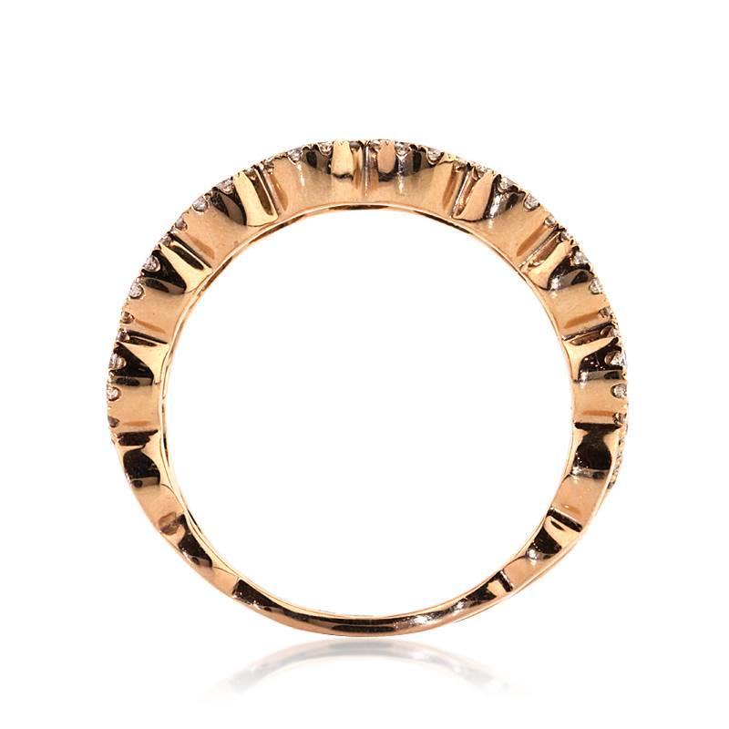 This stunning diamond ring features a beautiful woven design created in 14k rose gold and accented by 1.40ct of round brilliant cut diamonds. The diamonds are impeccably matched and graded at E-F, VS1-VS2. 