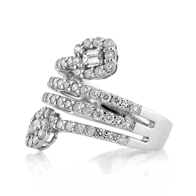 This stunning 18k white gold right-hand ring showcases 1.50ct of round brilliant cut diamonds, including two accent baguette cut diamonds at each tip of this sleek winding design. The diamonds sparkle intensely due to their gradings of E-F colors