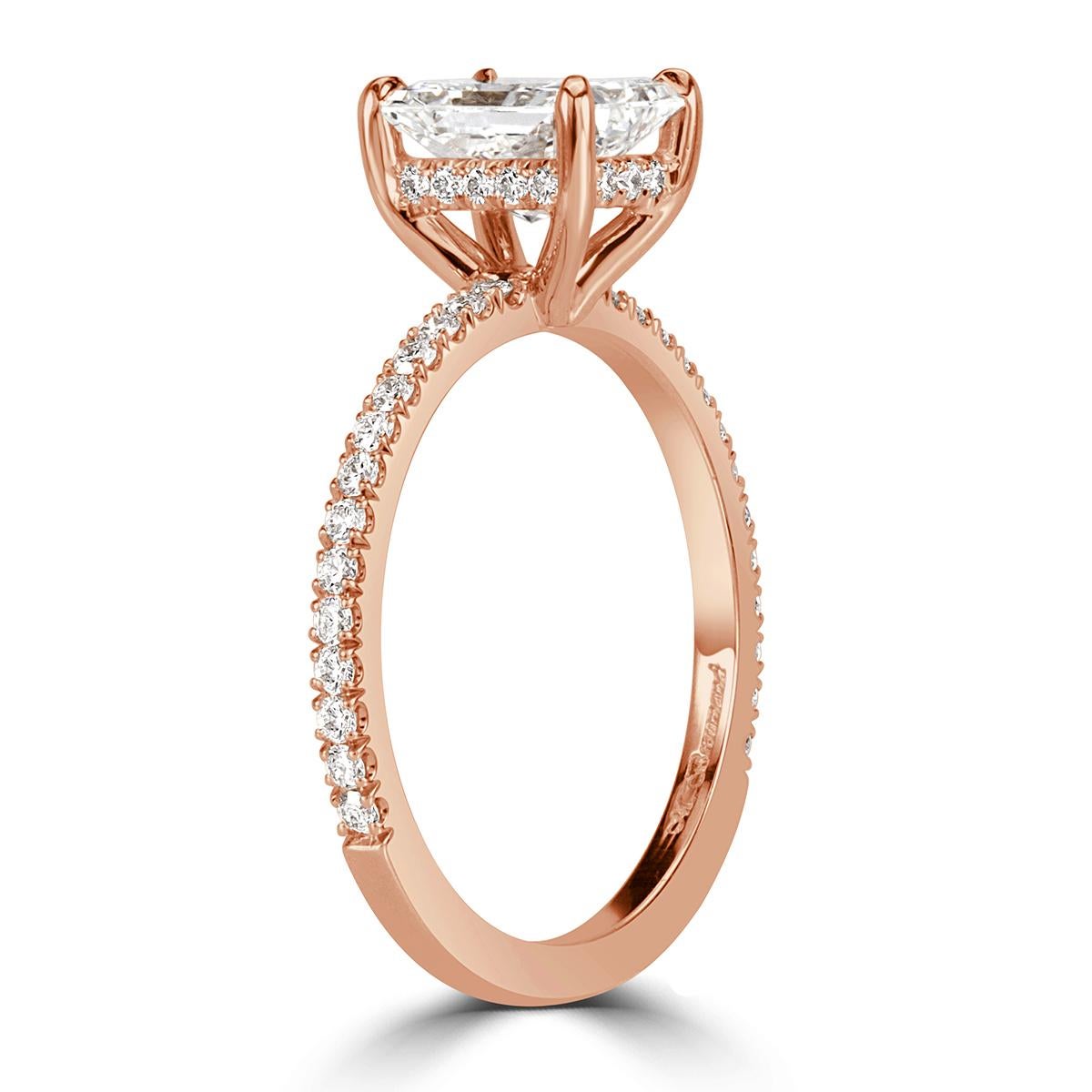 Created in our custom 18k rose gold, this stunning diamond engagement ring showcases a magnificent 1.30ct radiant cut center diamond, GIA certified at I in color, VS2 in clarity. It faces up white in addition of having an excellent cut grade in both